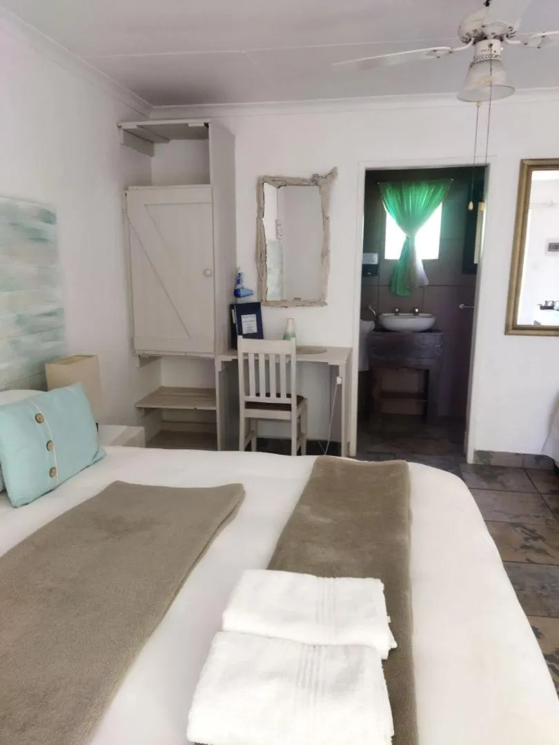 Bed in Ukarimu Guest House