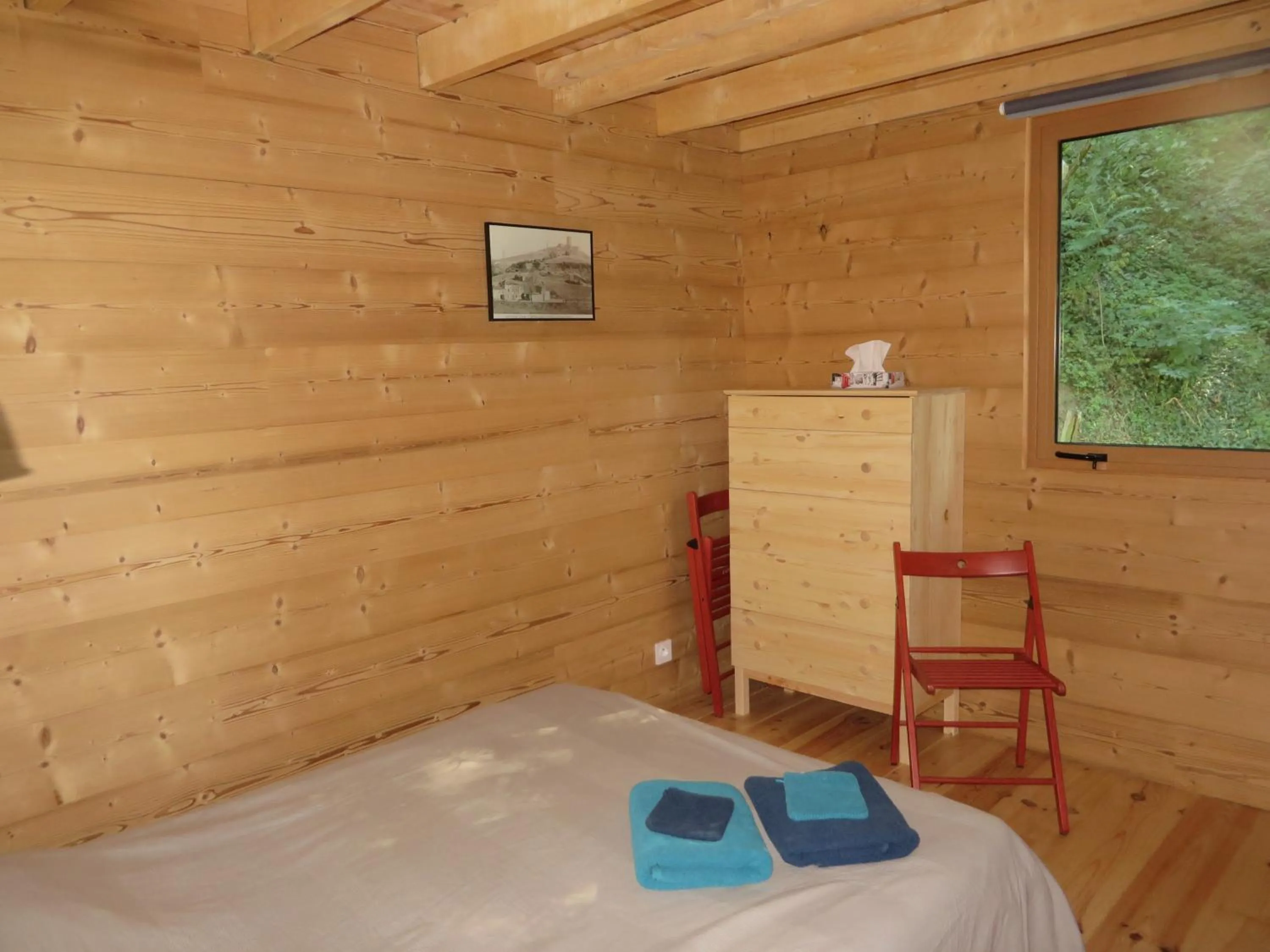 Bed in La Cabane aux Sapins
