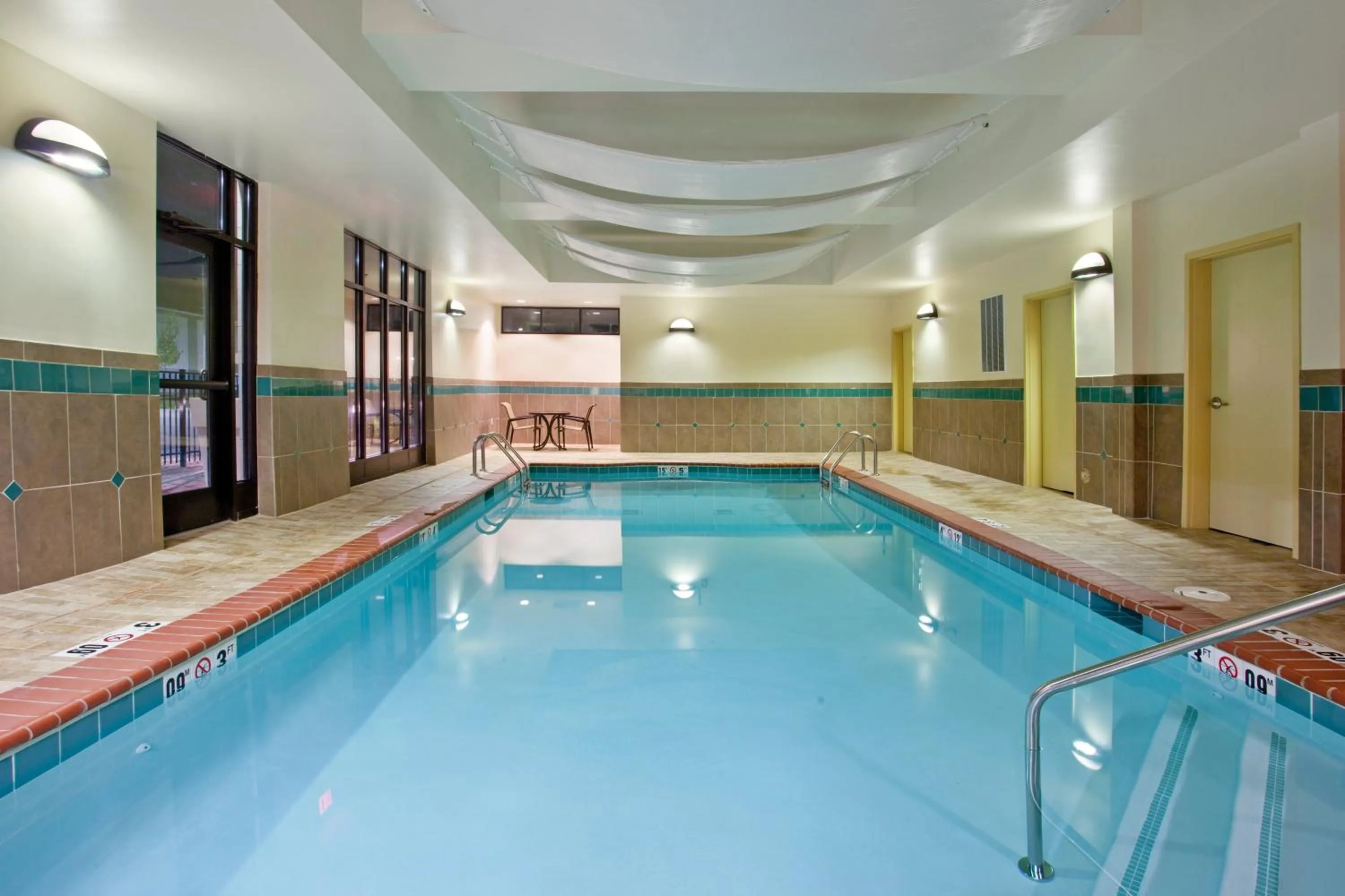 Swimming pool in Holiday Inn Saint Louis-Fairview Heights by IHG