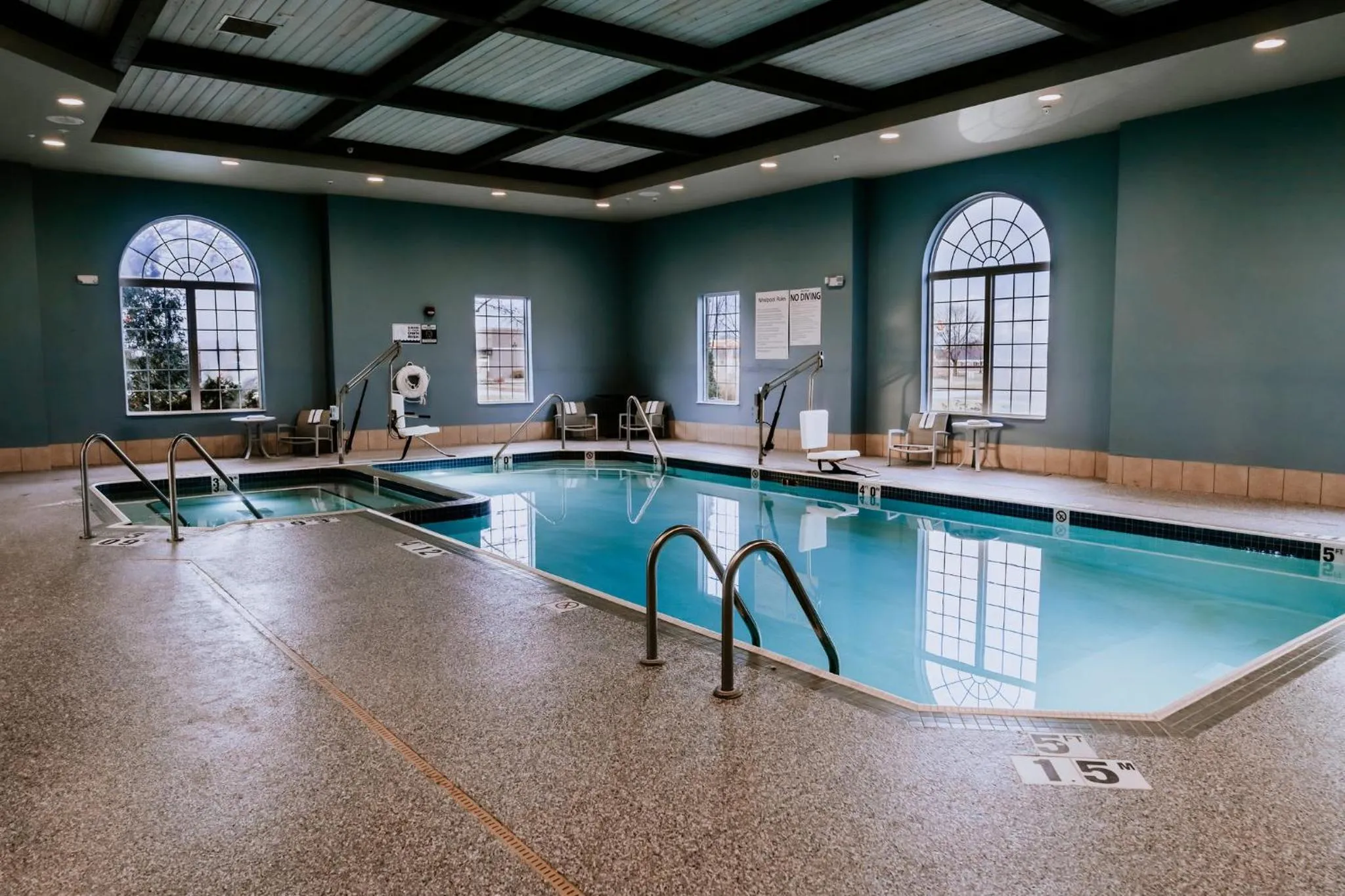 Swimming pool in Holiday Inn Express Hotel & Suites Oshkosh - State Route 41 by IHG