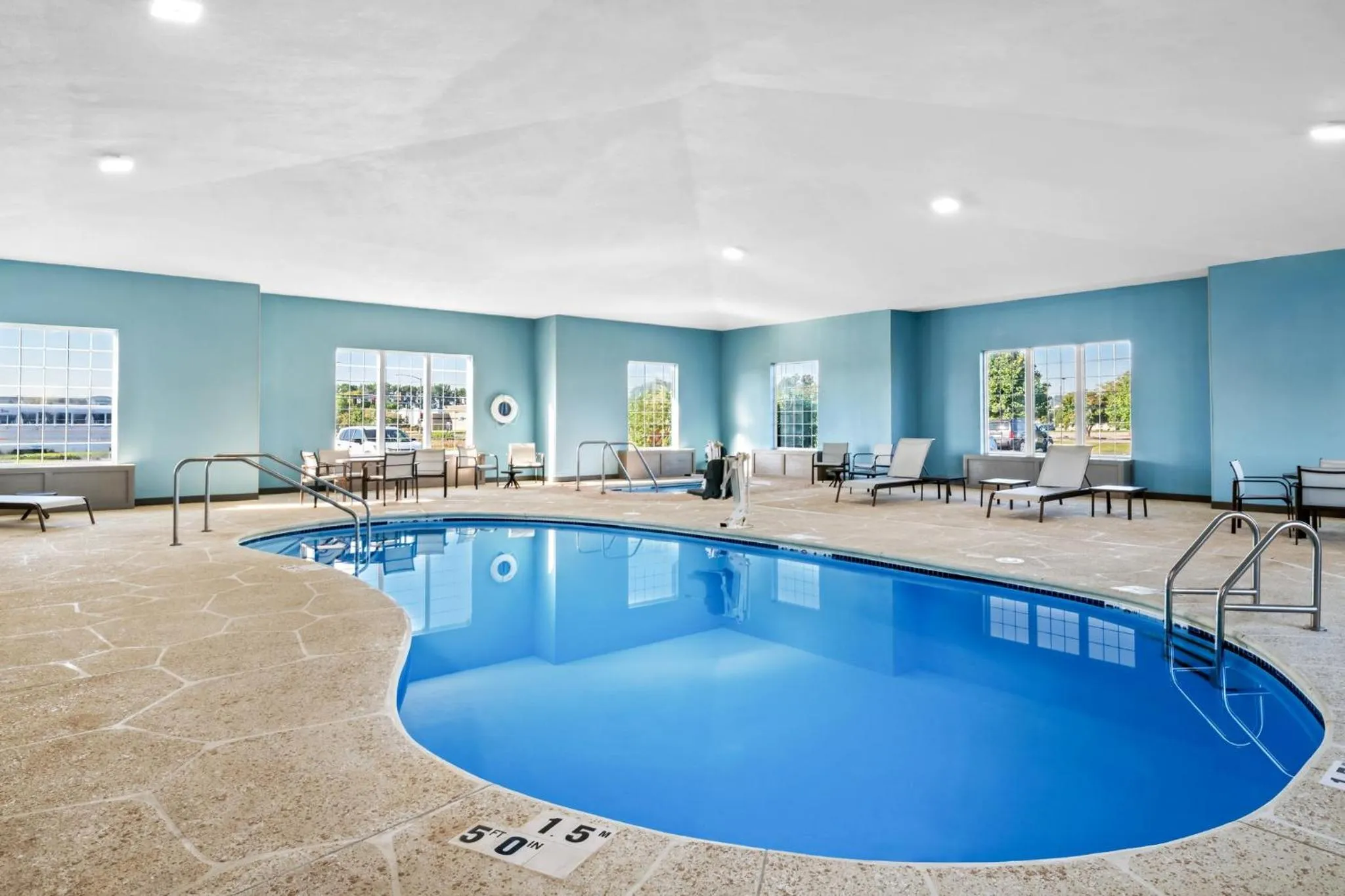 Swimming pool in Holiday Inn Express Hotel & Suites Council Bluffs - Convention Center Area by IHG