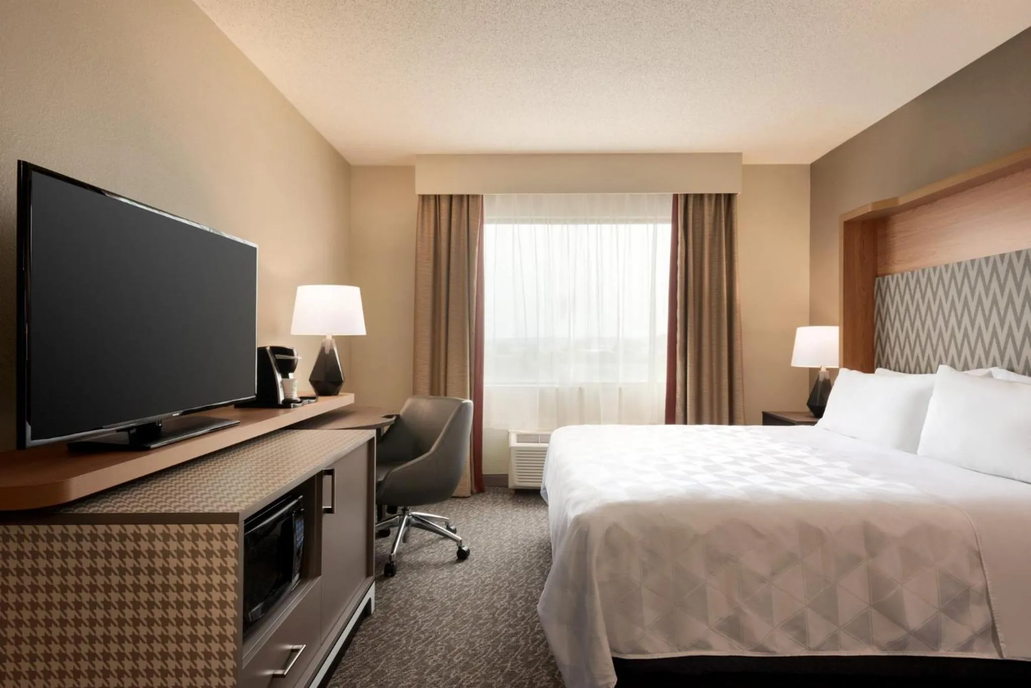 Photo of the whole room, Bed in Holiday Inn Hotel & Suites Council Bluffs by IHG