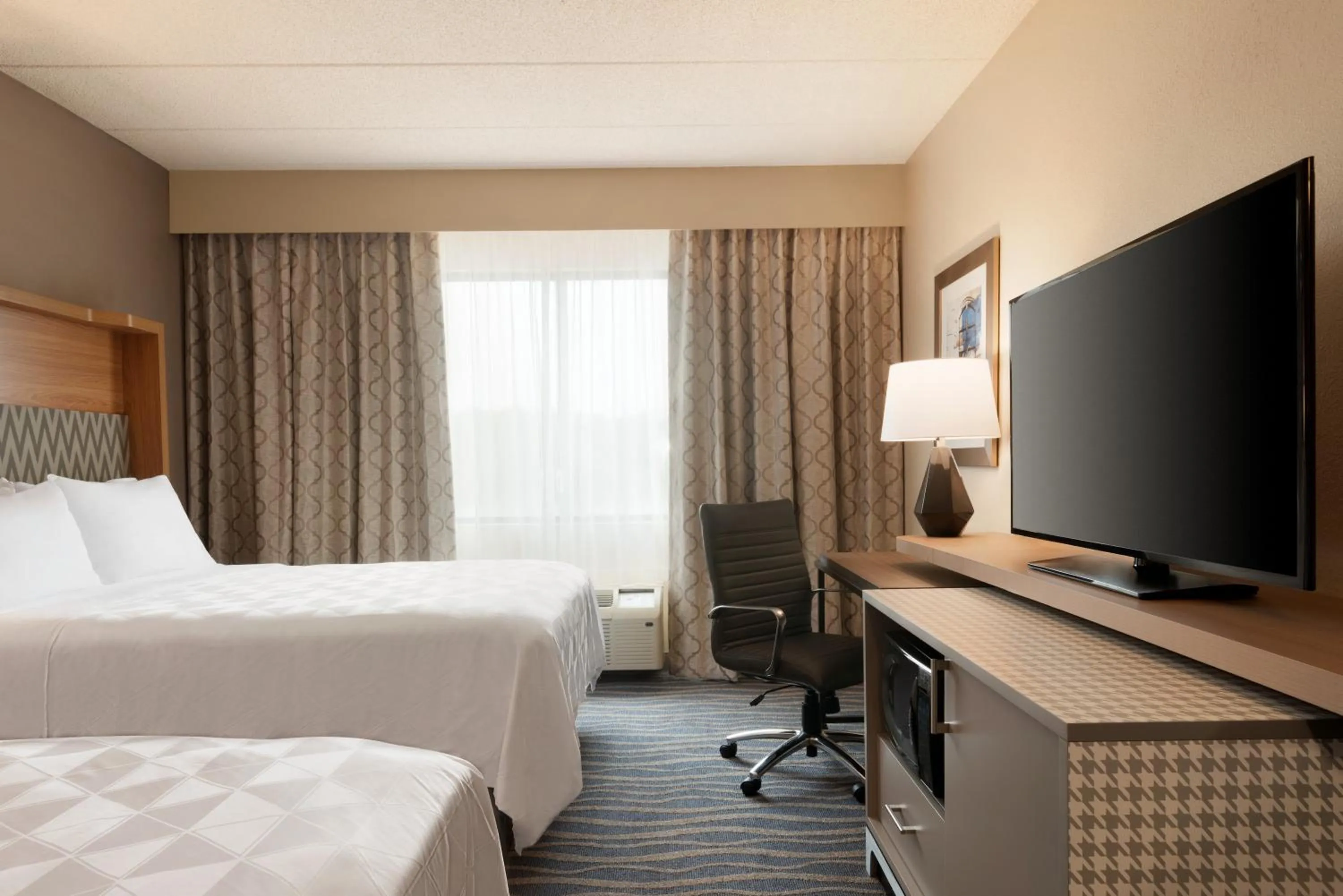 Bed in Holiday Inn Hotel & Suites Council Bluffs by IHG