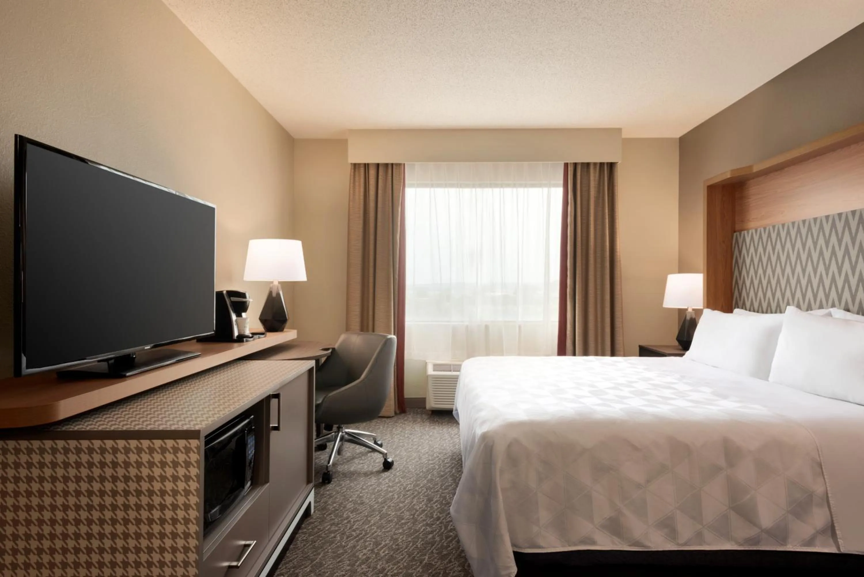 Bed in Holiday Inn Hotel & Suites Council Bluffs by IHG
