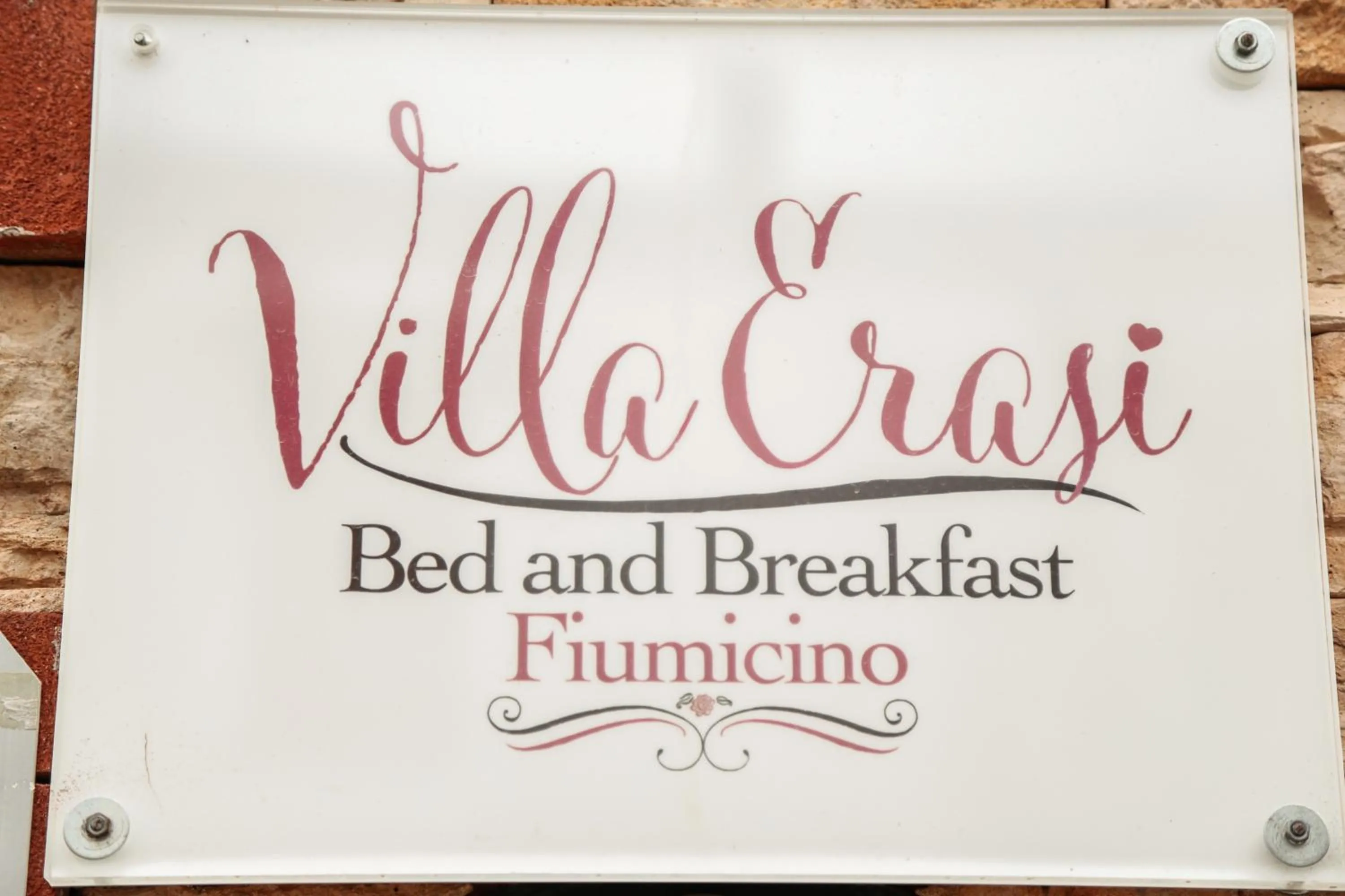 Property logo or sign in Villa Erasi