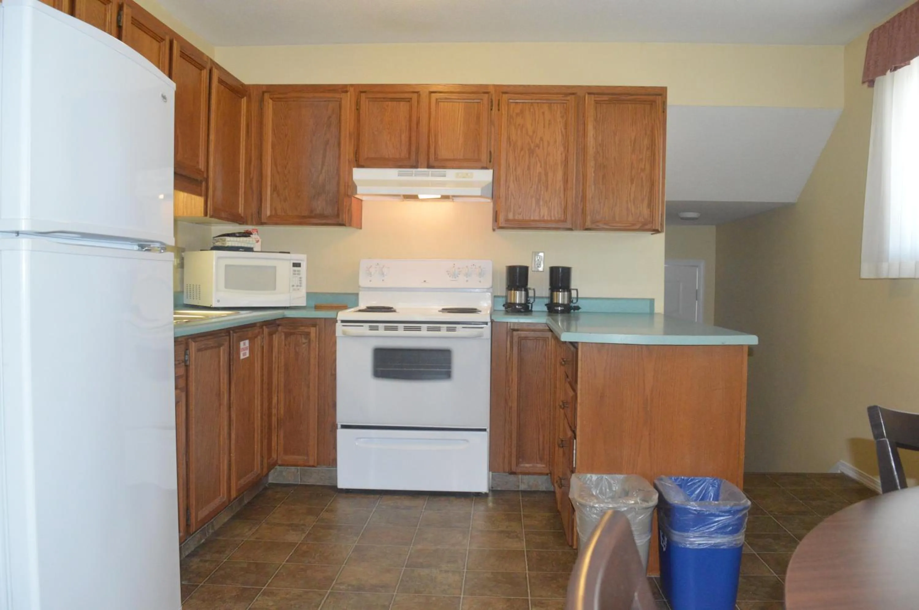 Kitchen or kitchenette in Siesta Suites