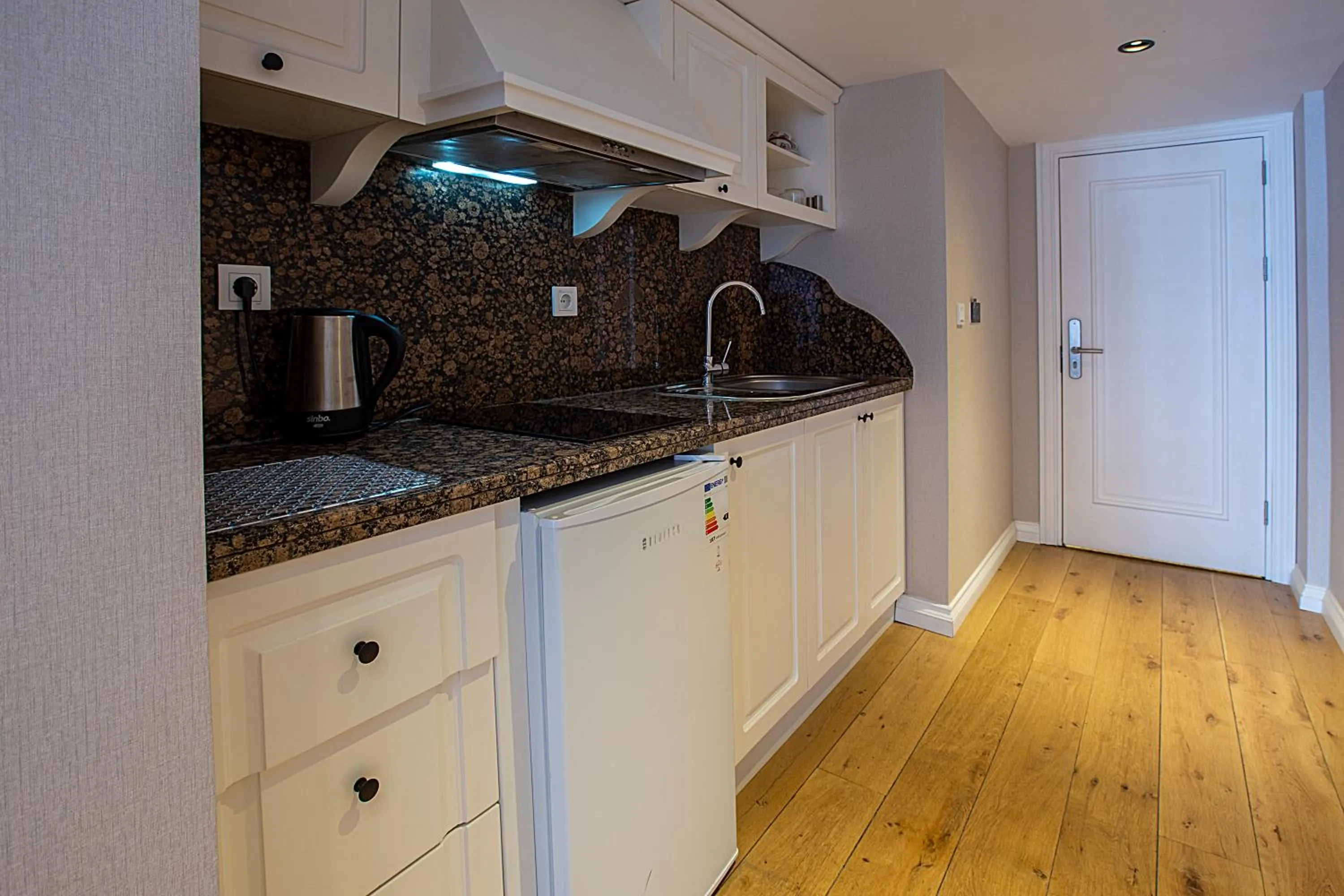 Kitchen or kitchenette in Moss Suites Hotel