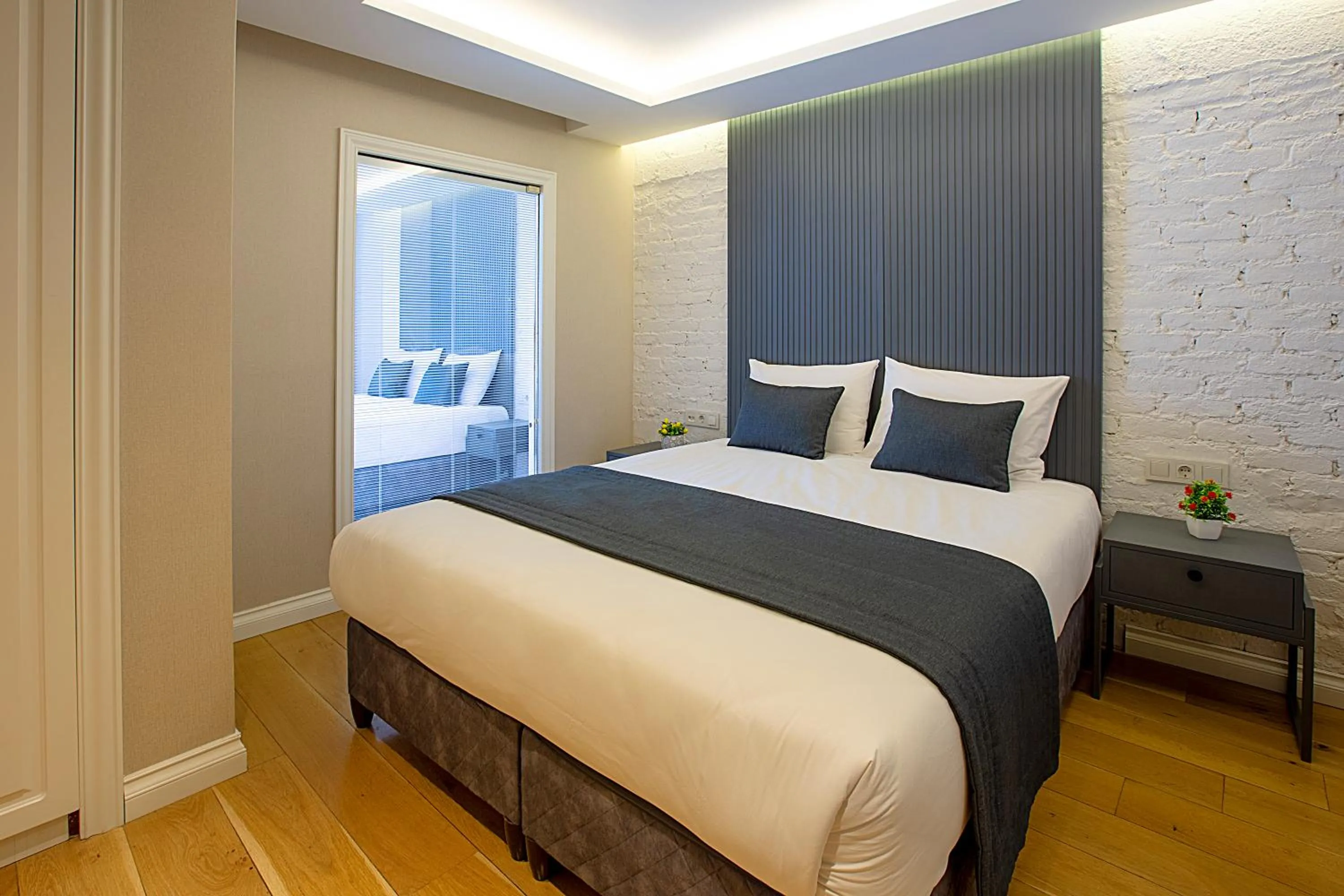 Bed in Moss Suites Hotel