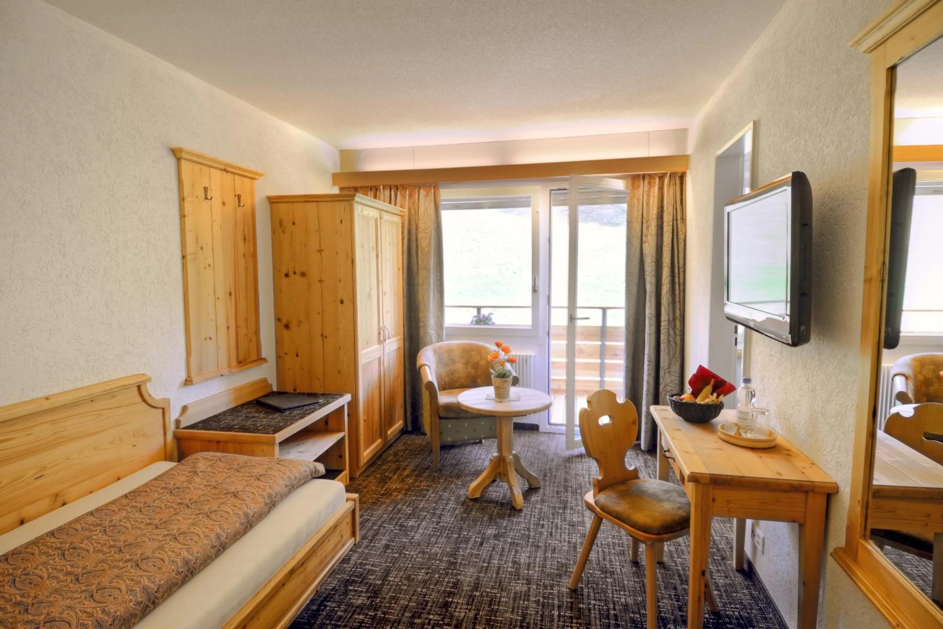 Photo of the whole room, Bed in Hotel Restaurant Alpina