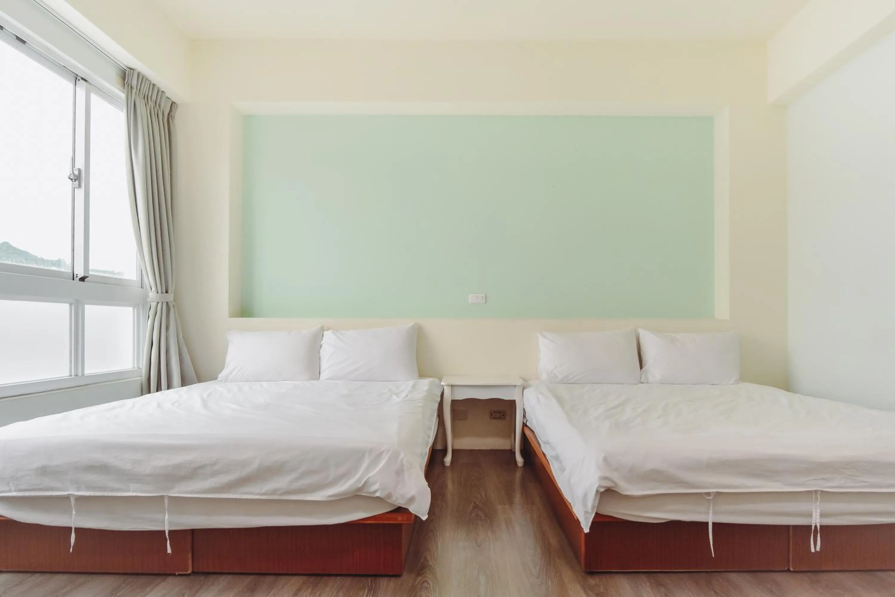 Bed in Siang Jhan B&B