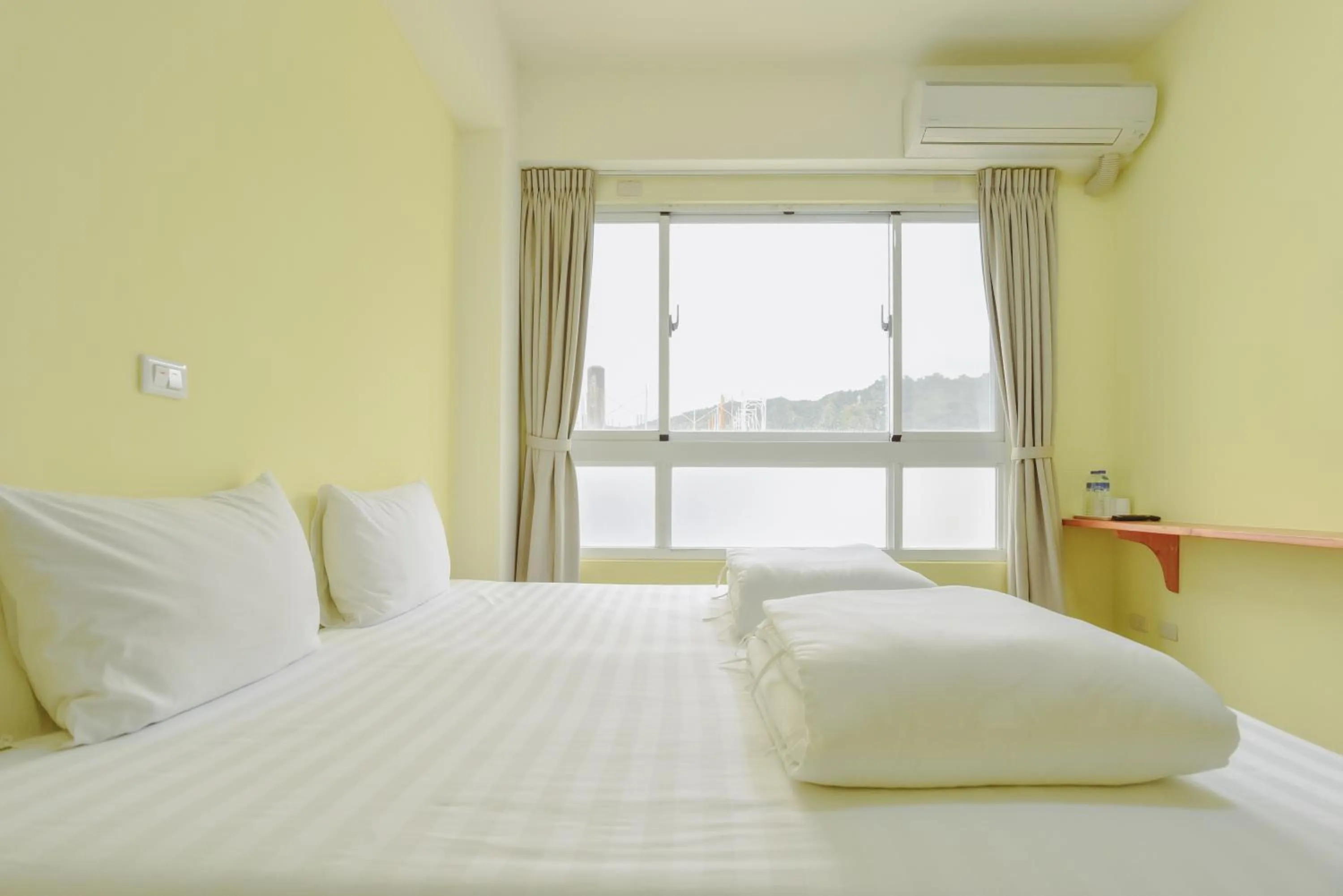 Bed in Siang Jhan B&B