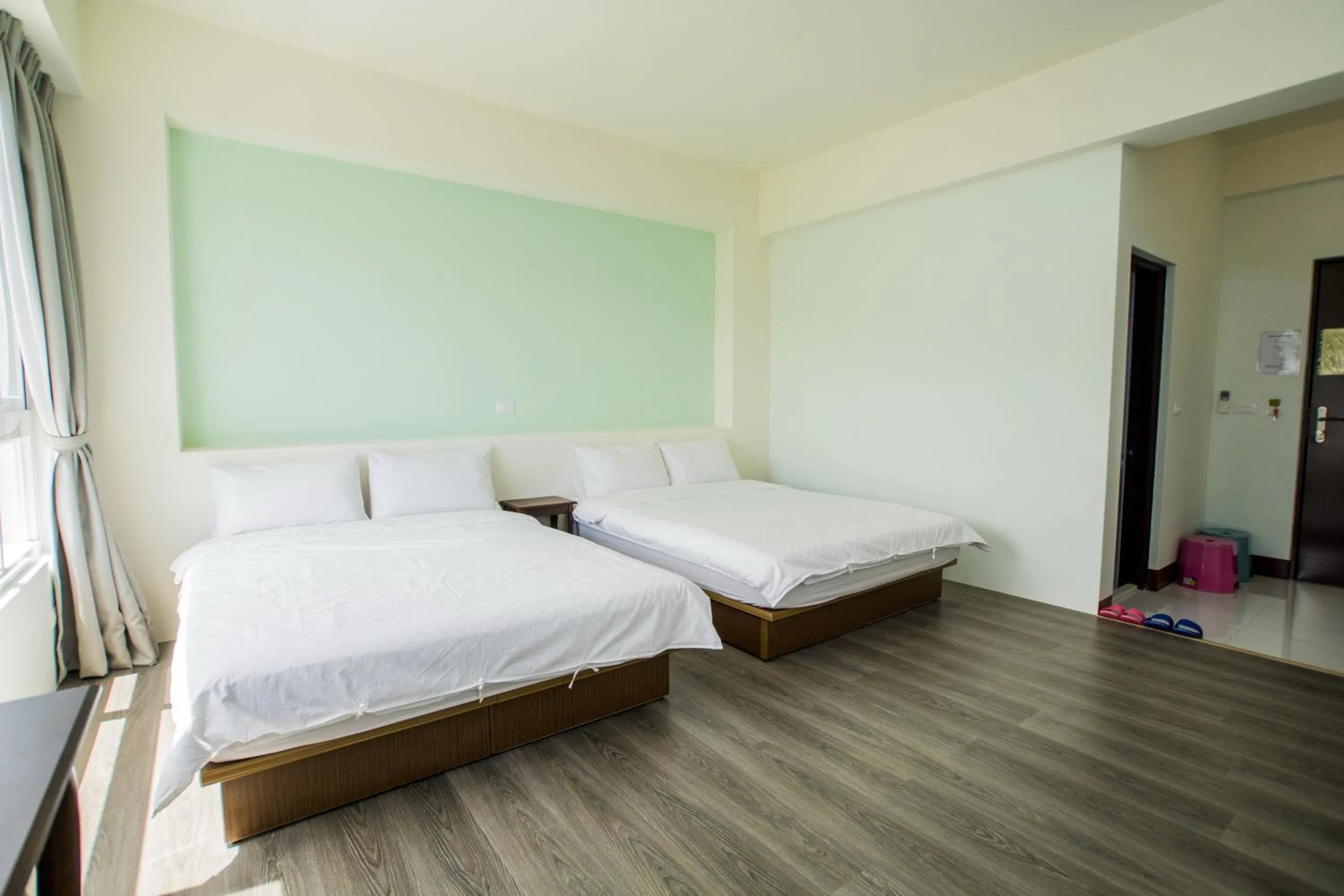 Bed in Siang Jhan B&B