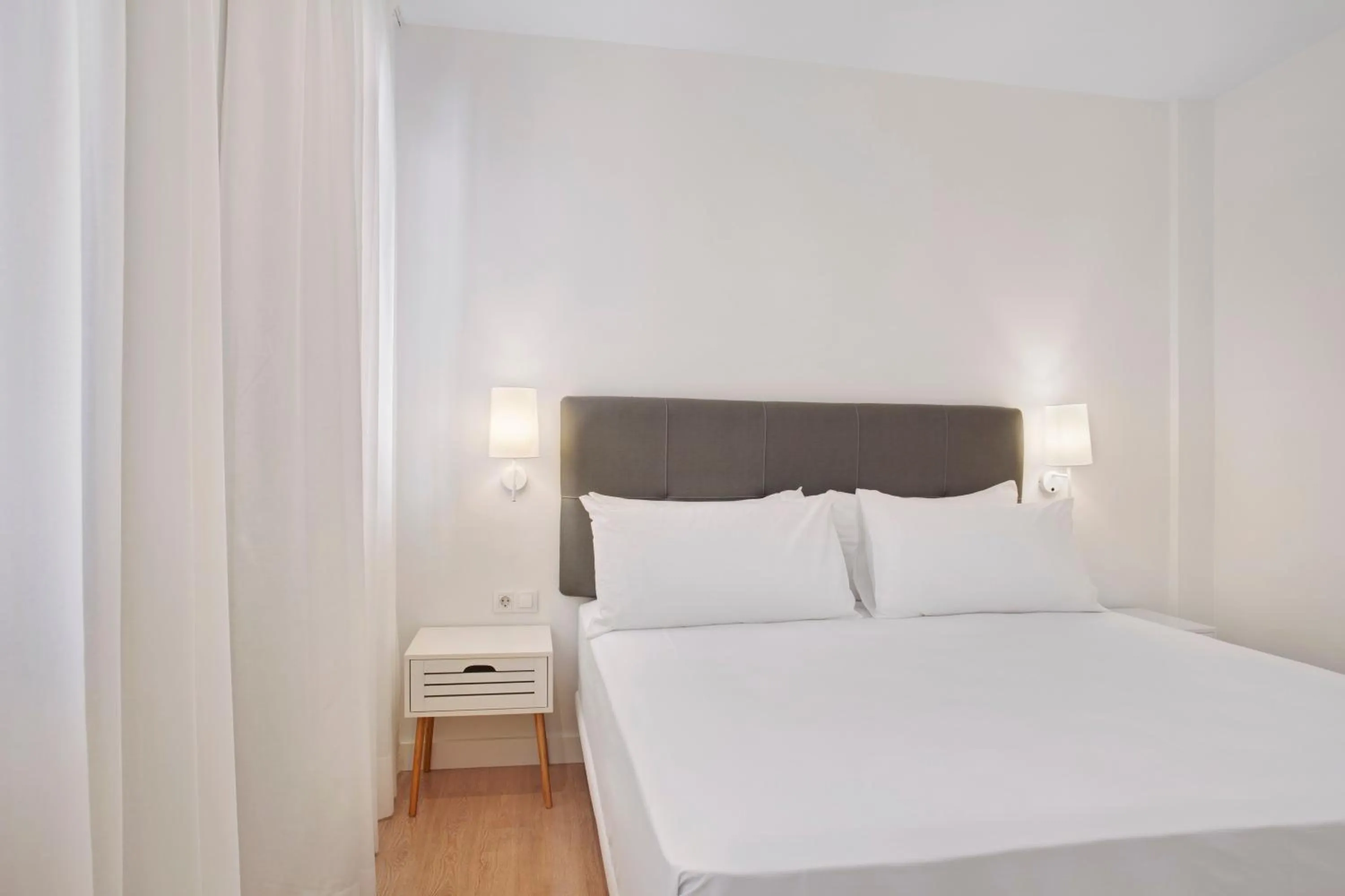 Bed in Apartamentos Metrópolis