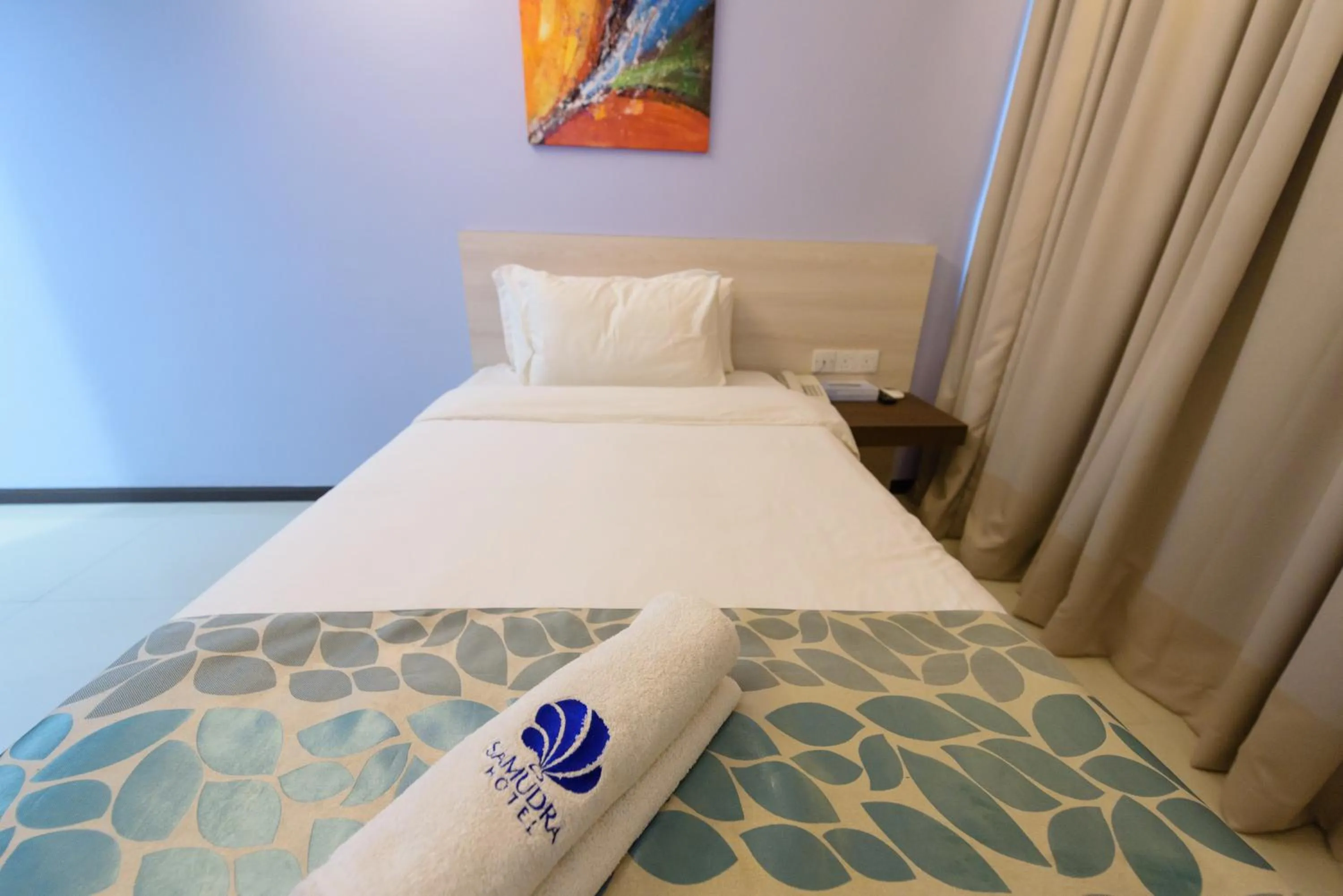 Bed in Samudra Hotel Kuching