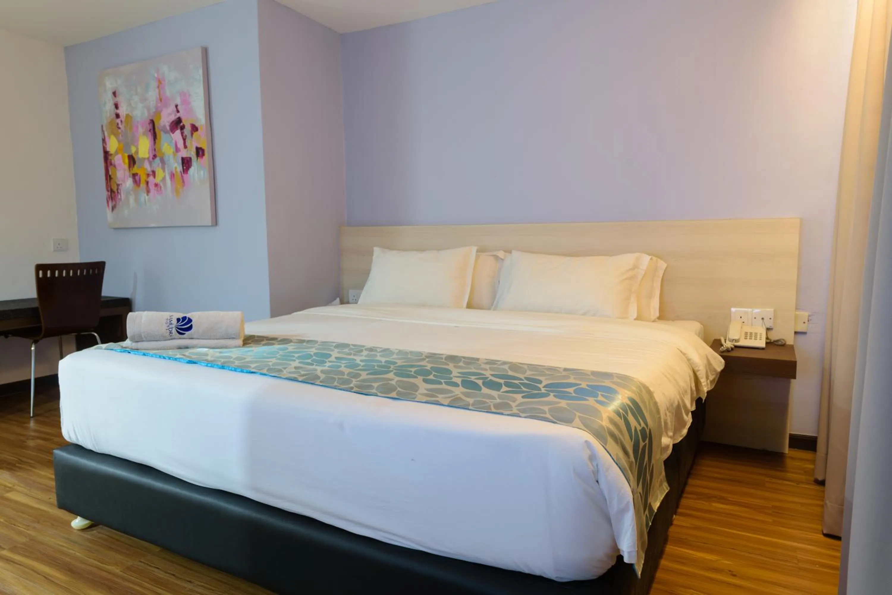 Bed in Samudra Hotel Kuching