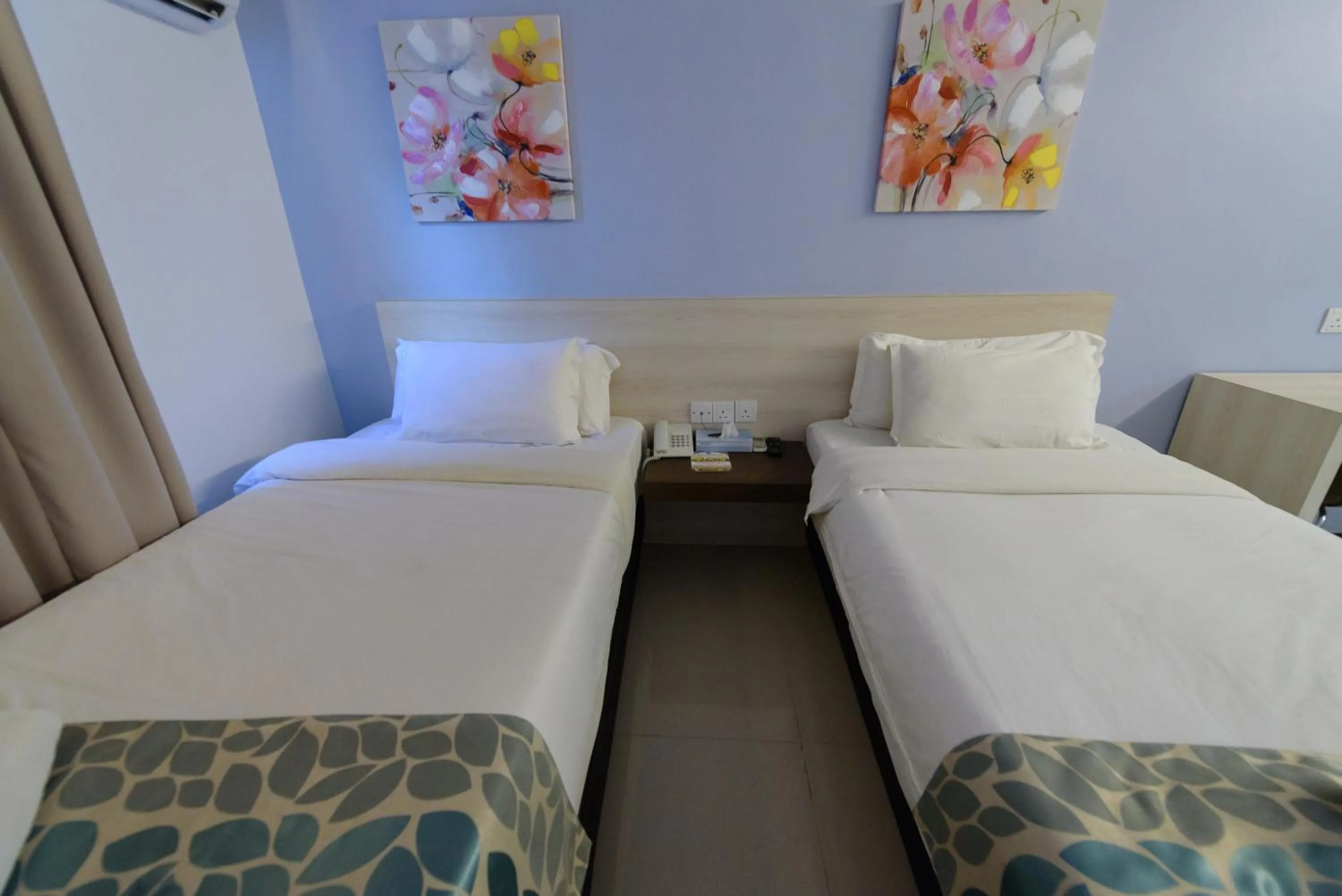 Bed in Samudra Hotel Kuching