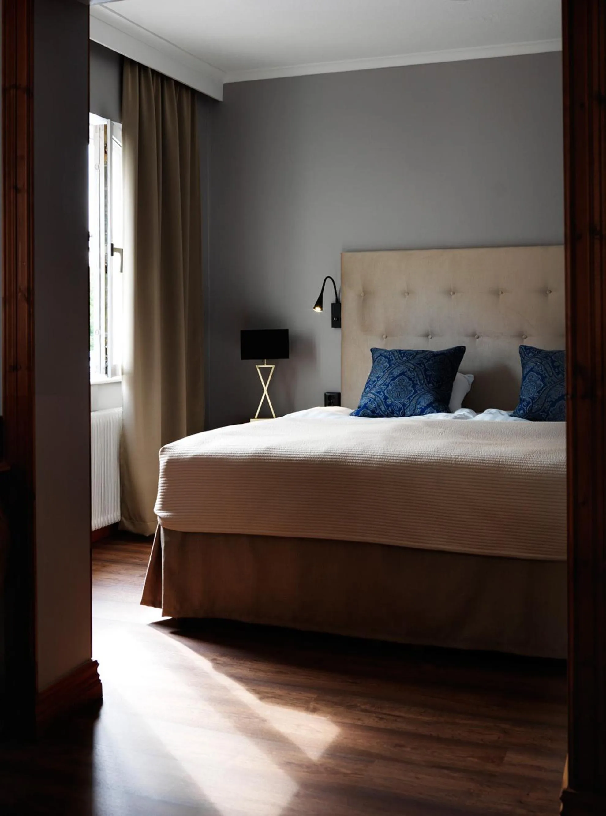 Bed in Clarion Collection Hotel Smedjan