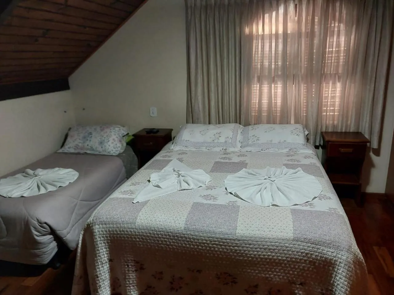 Bed in Pousada Heron