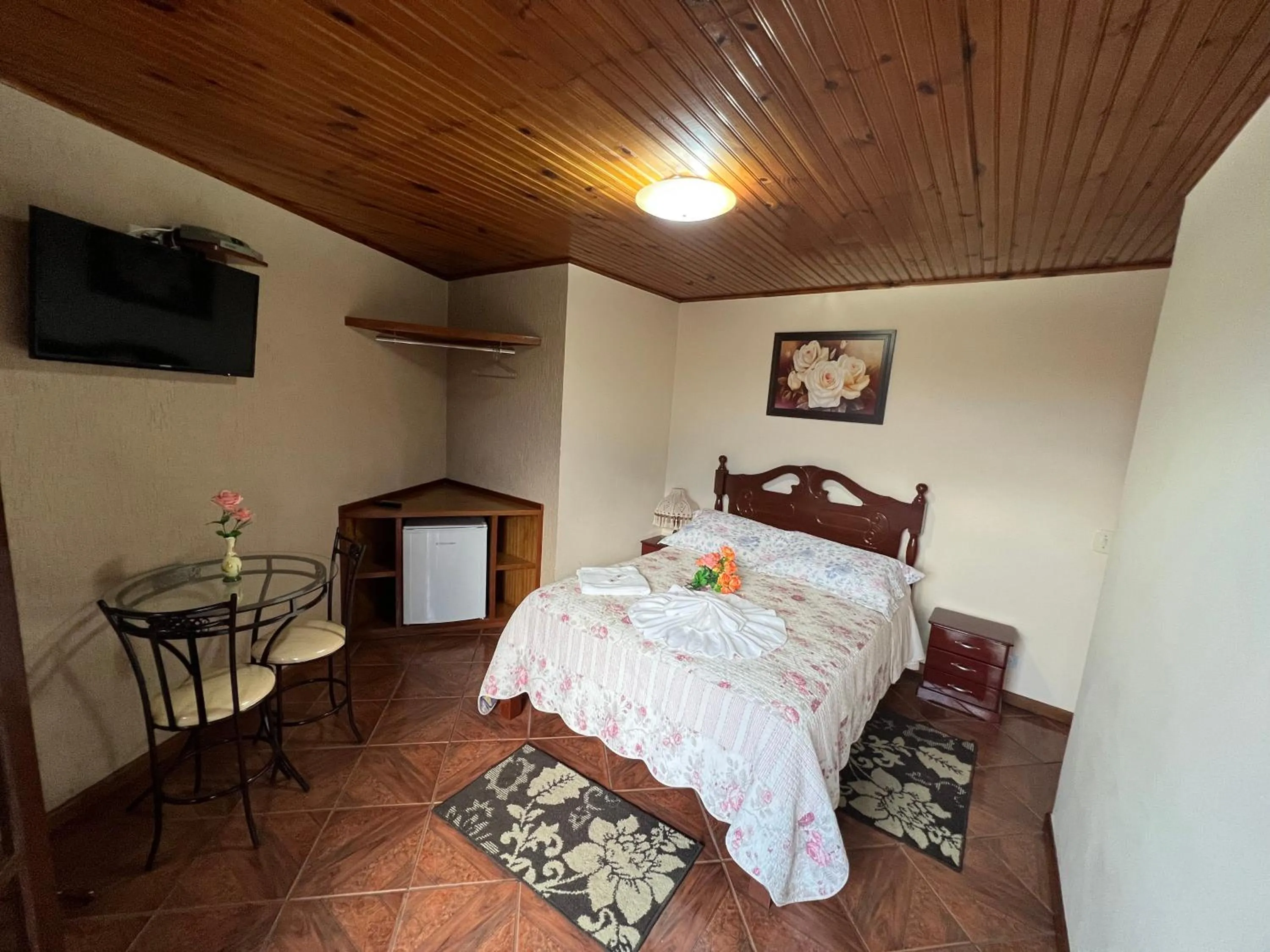 Bed in Pousada Heron