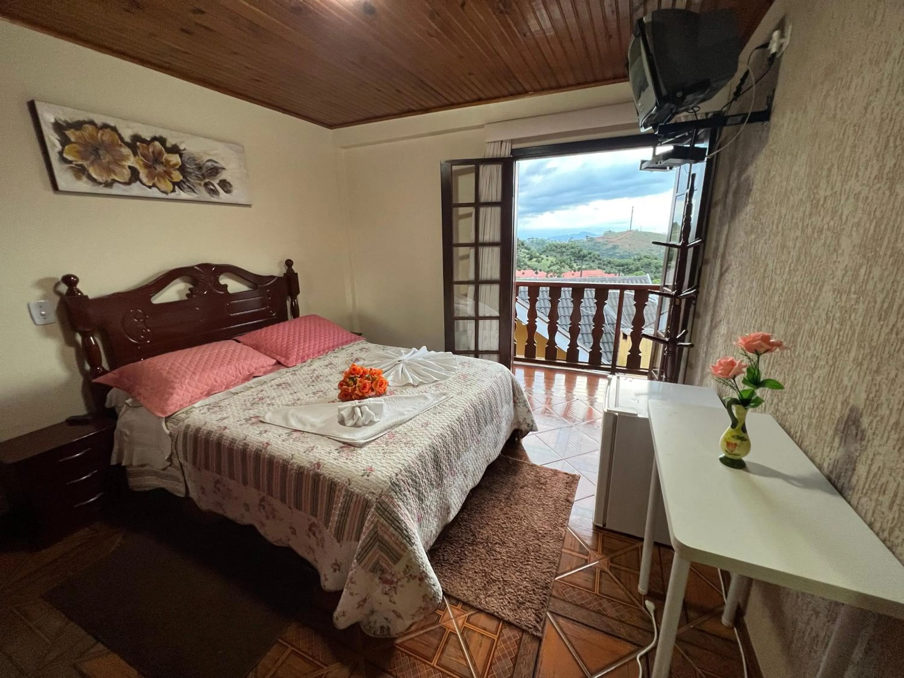 Bed in Pousada Heron