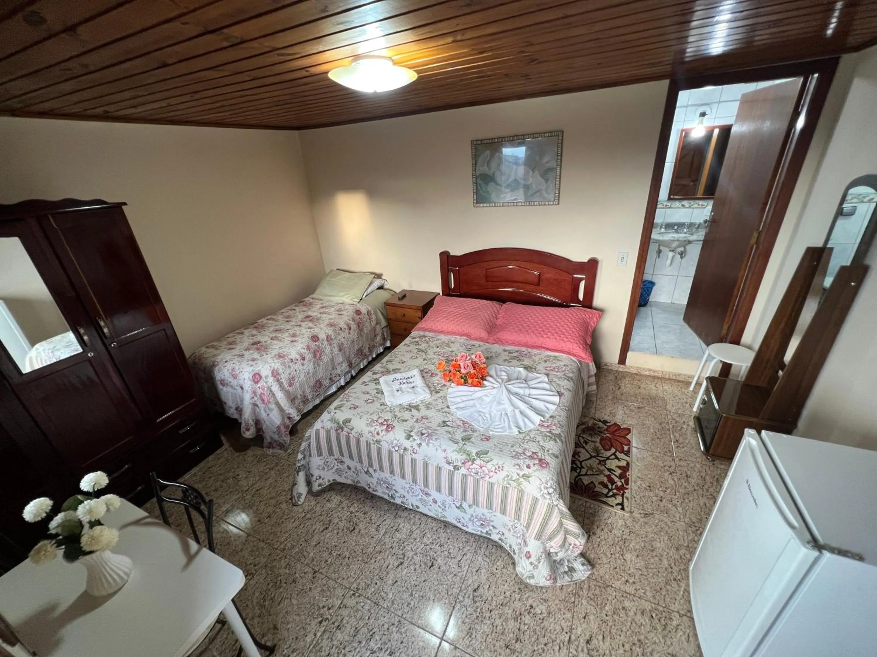 Bed in Pousada Heron