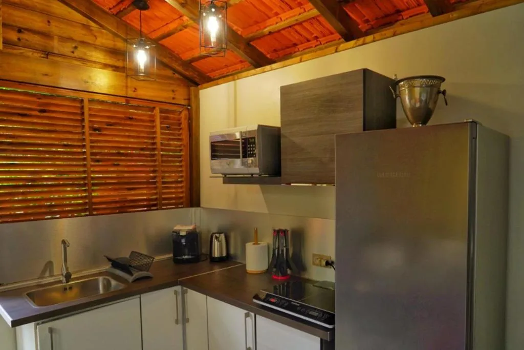 Kitchen or kitchenette in Redoute Paradise