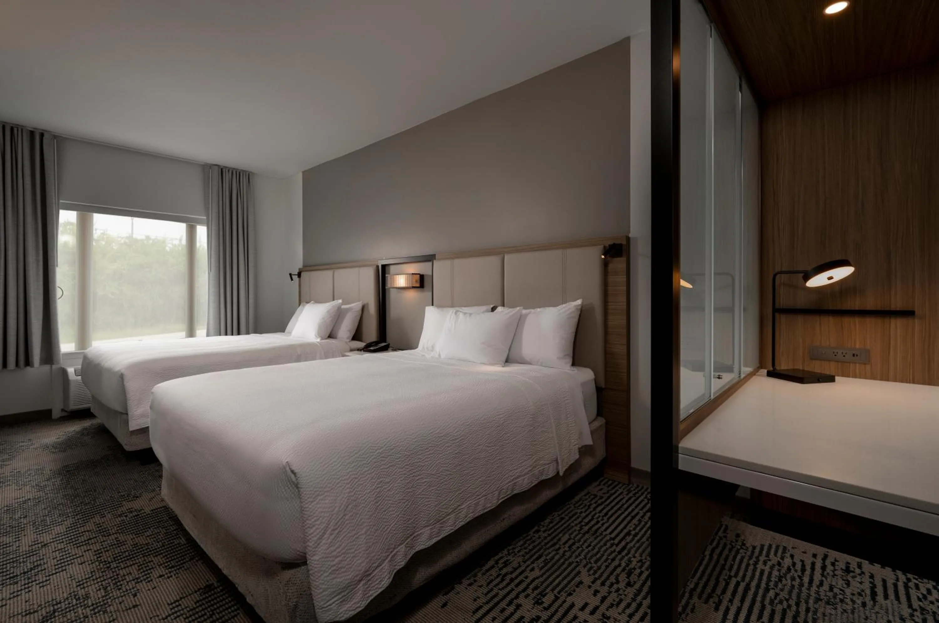 Bed in SpringHill Suites by Marriott Houston Brookhollow