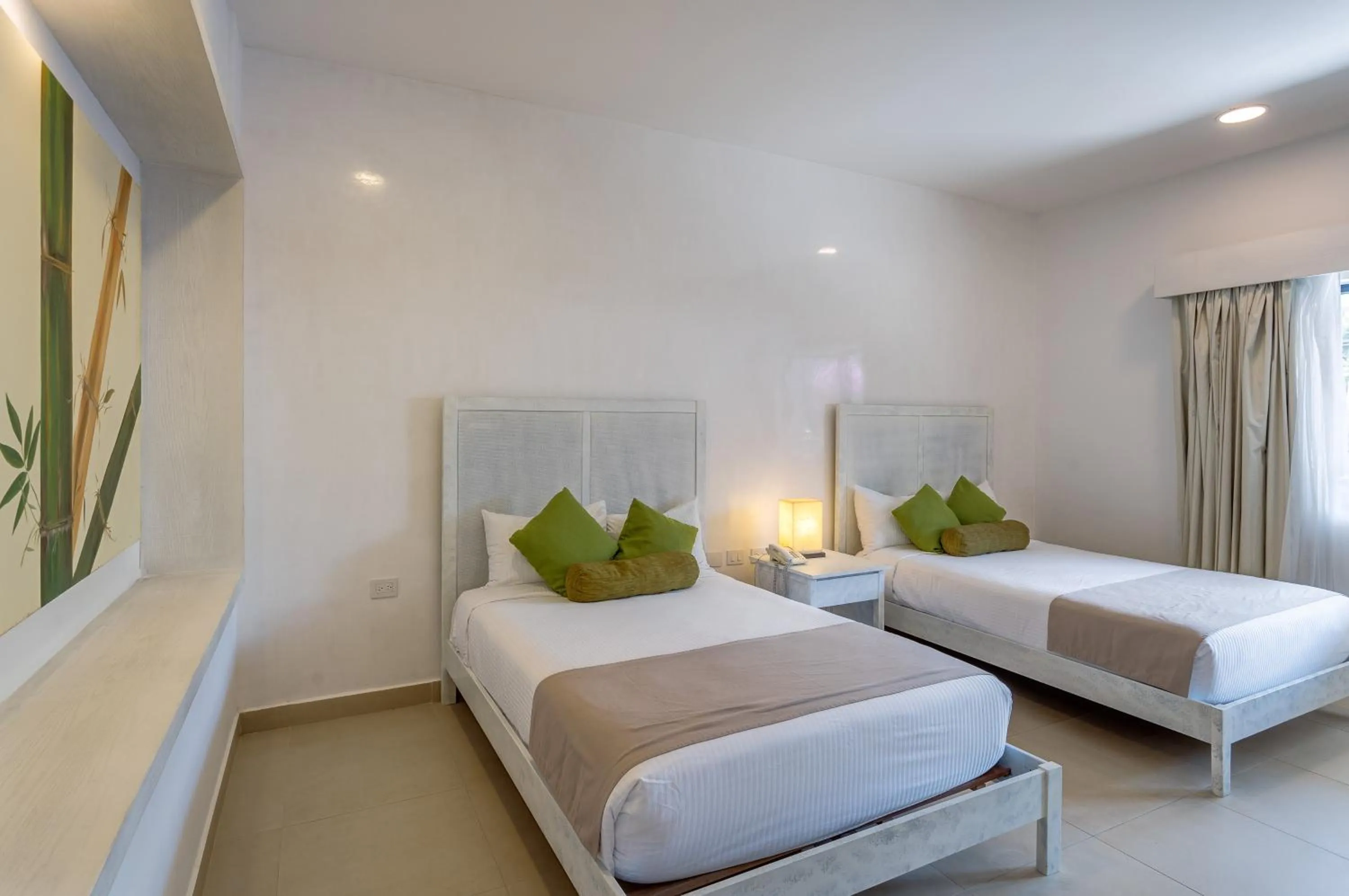 Bed in Aldea Thai by Mistik Vacation Rentals