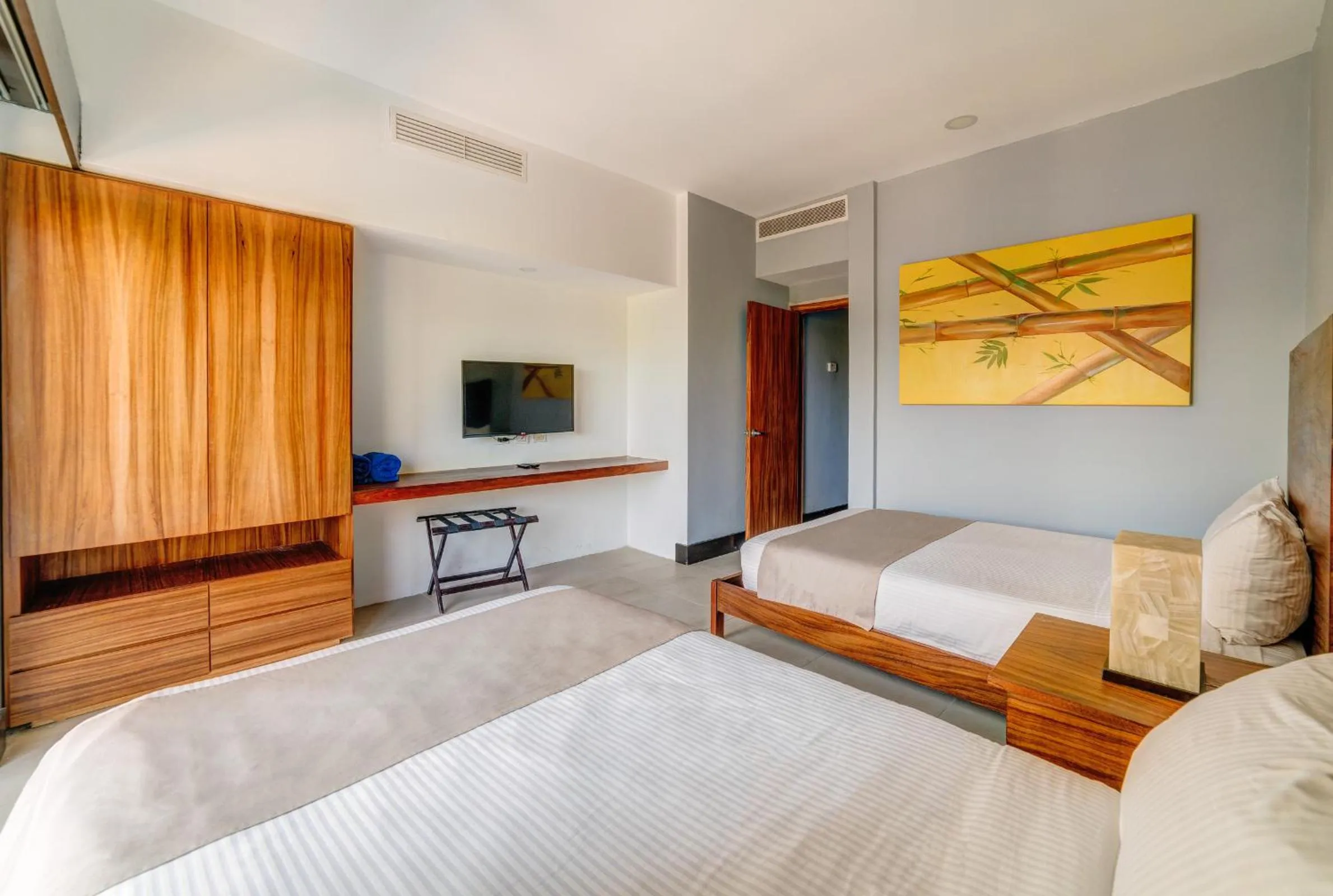 Bed in Aldea Thai by Mistik Vacation Rentals