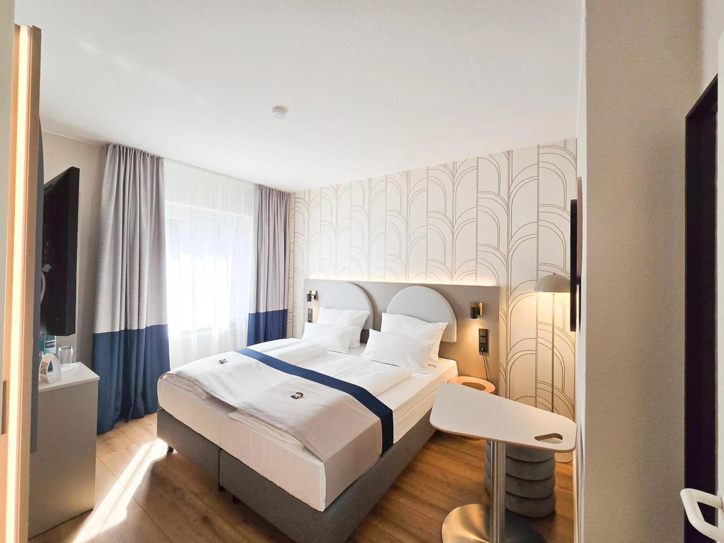 Bed in guestified LIYANA Hotel