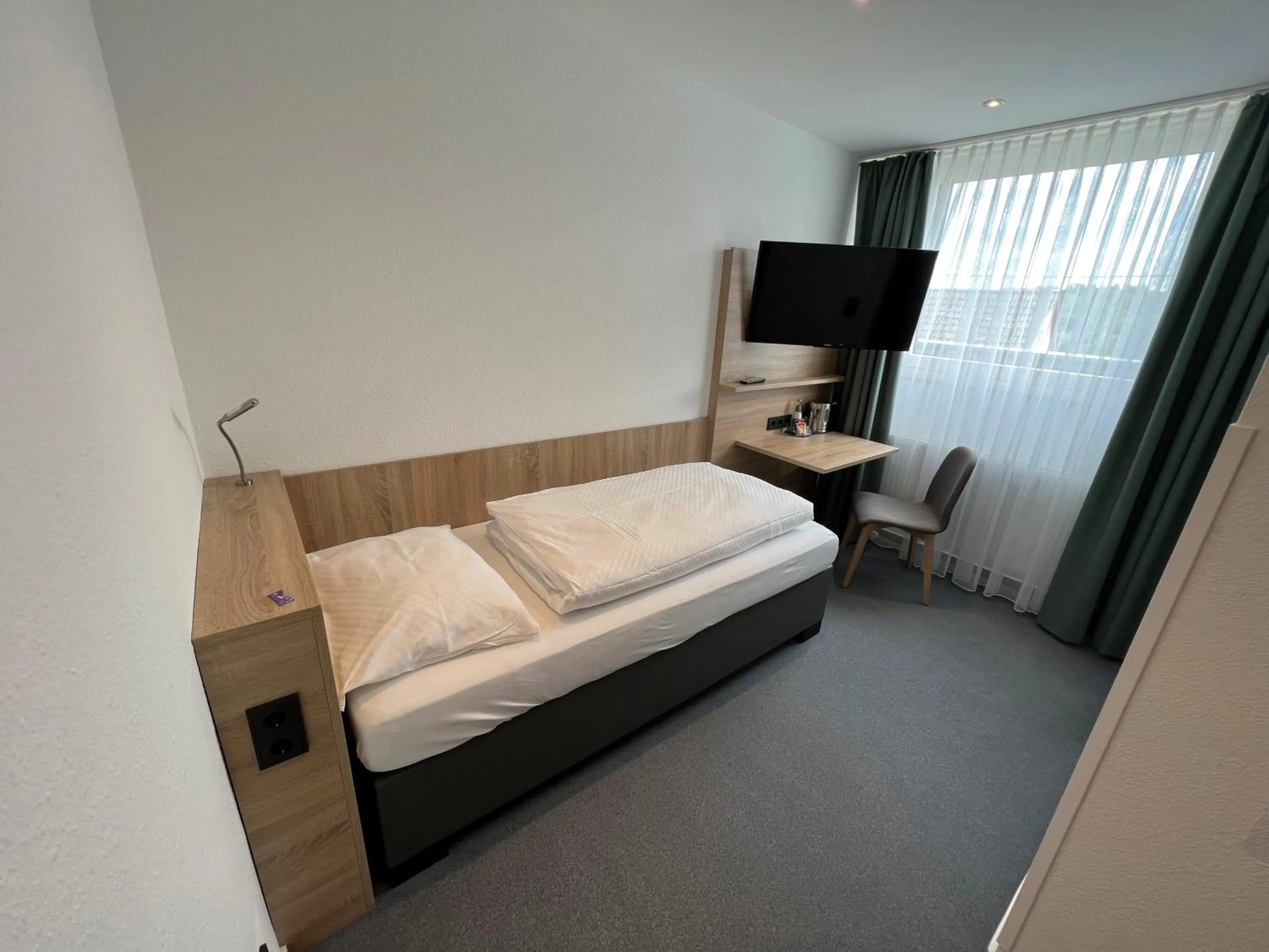 Photo of the whole room, Bed in Hotel Am Tiergarten