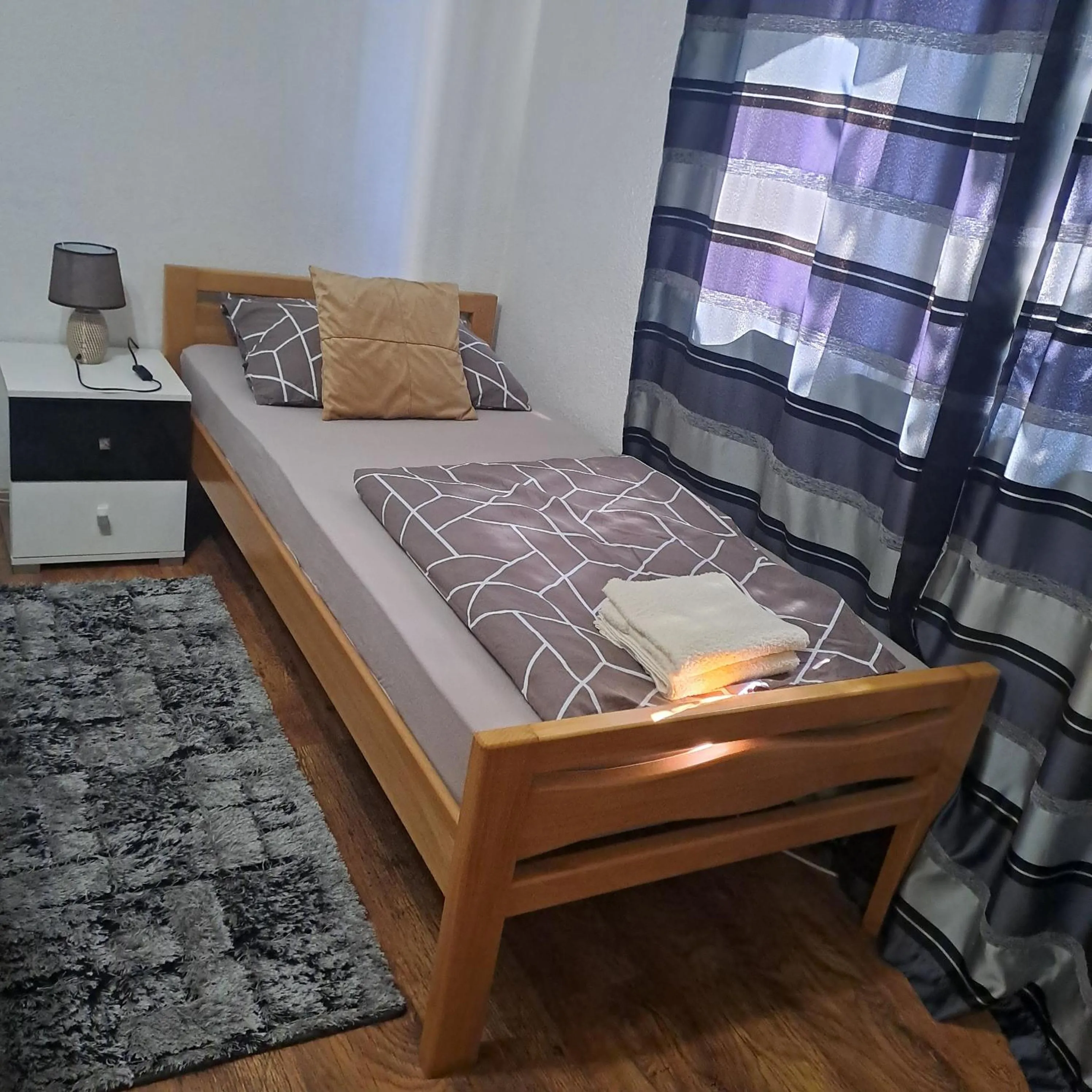 Bed in Apartment Beha