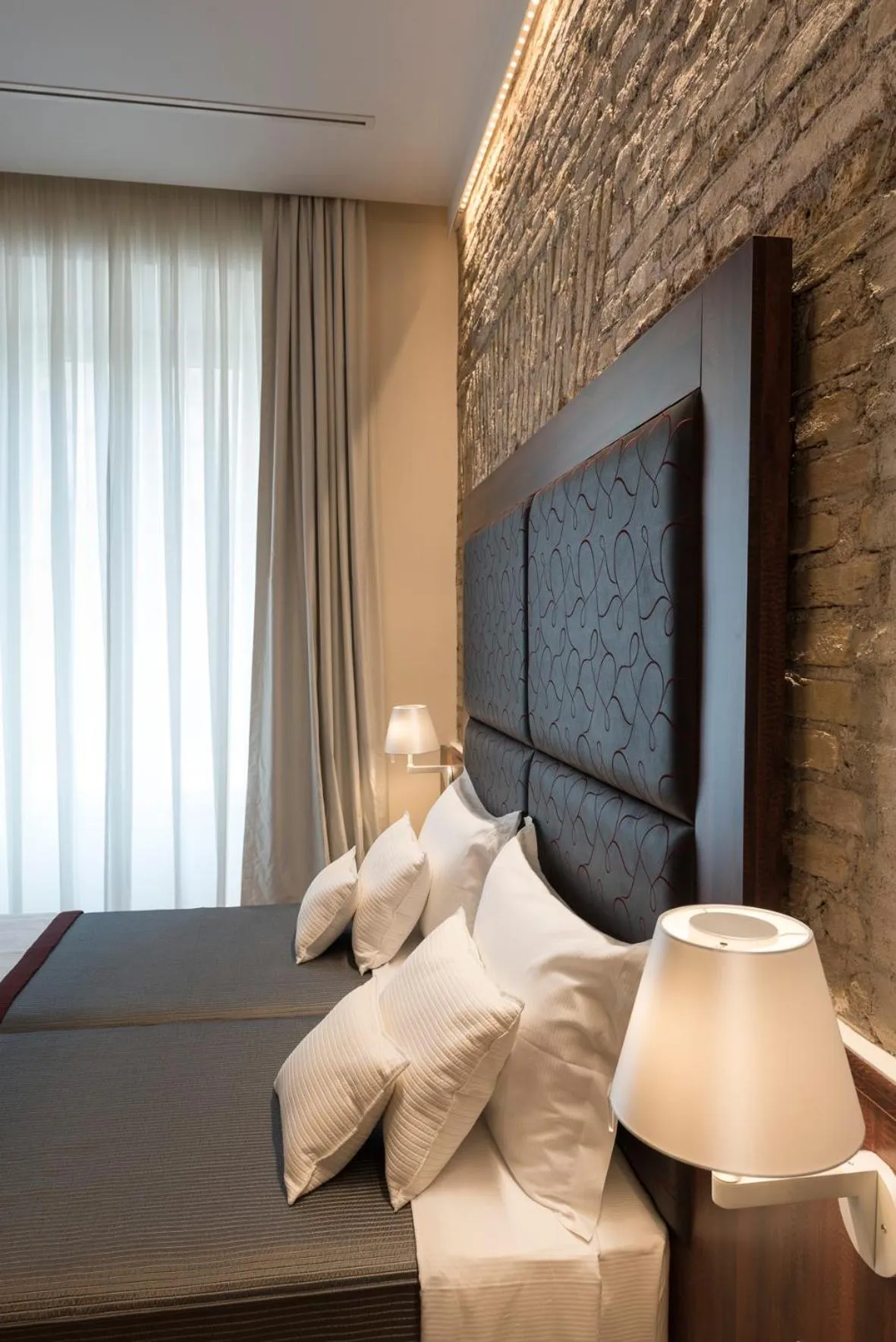 Decorative detail, Bed in Navona Luxury Guesthouse