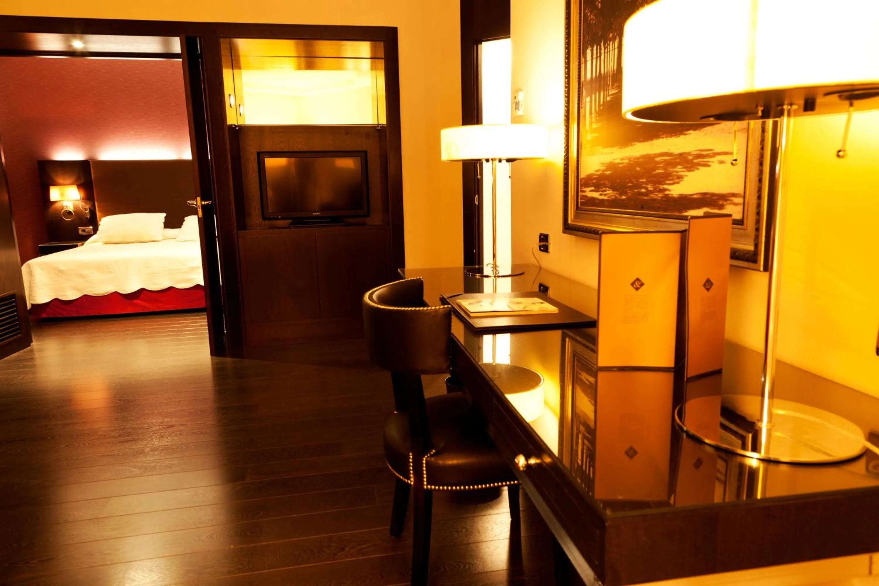 Living room, Bed in Hotel Boutique Gareus