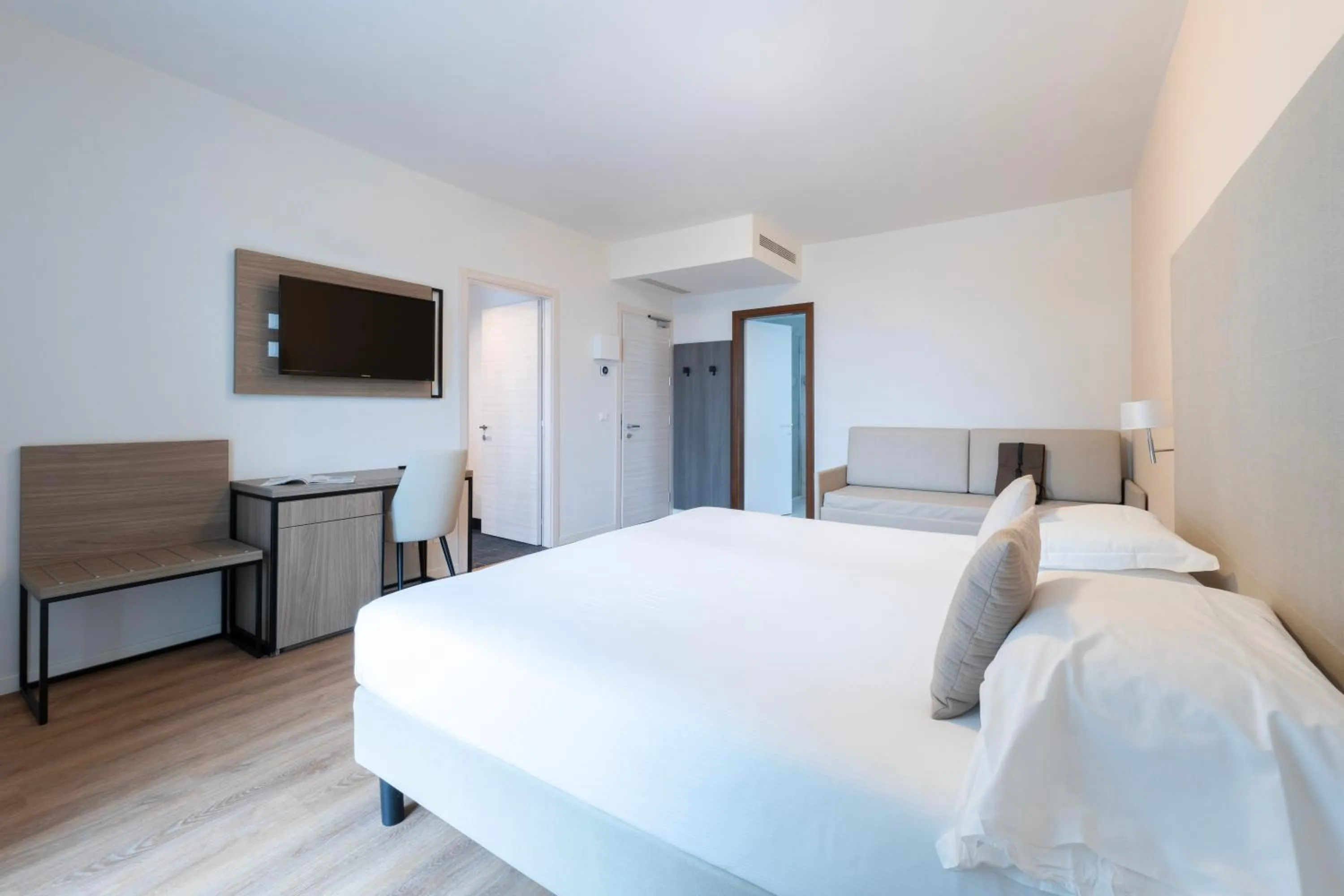 Bed in Hotel Excelsior