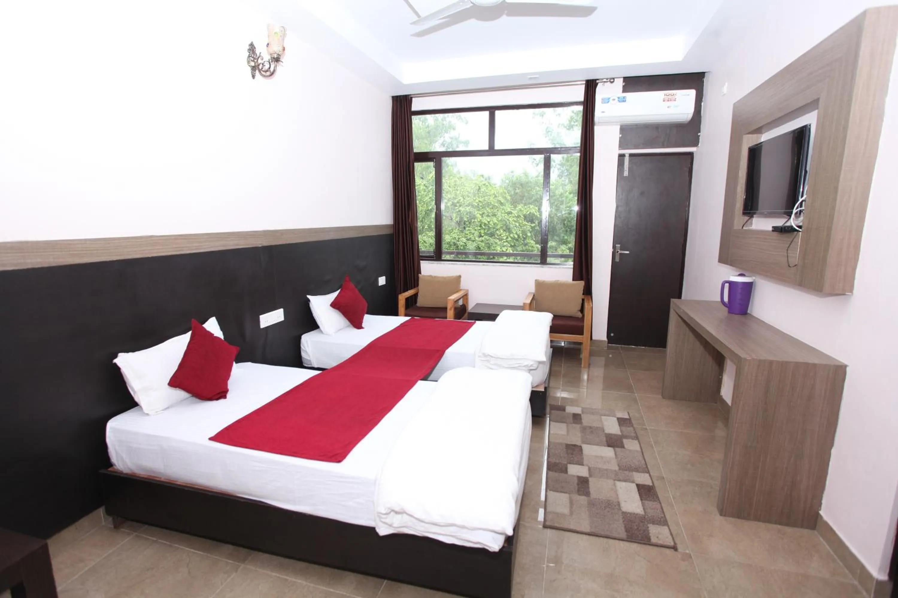 Photo of the whole room, Bed in Hotel Trihari