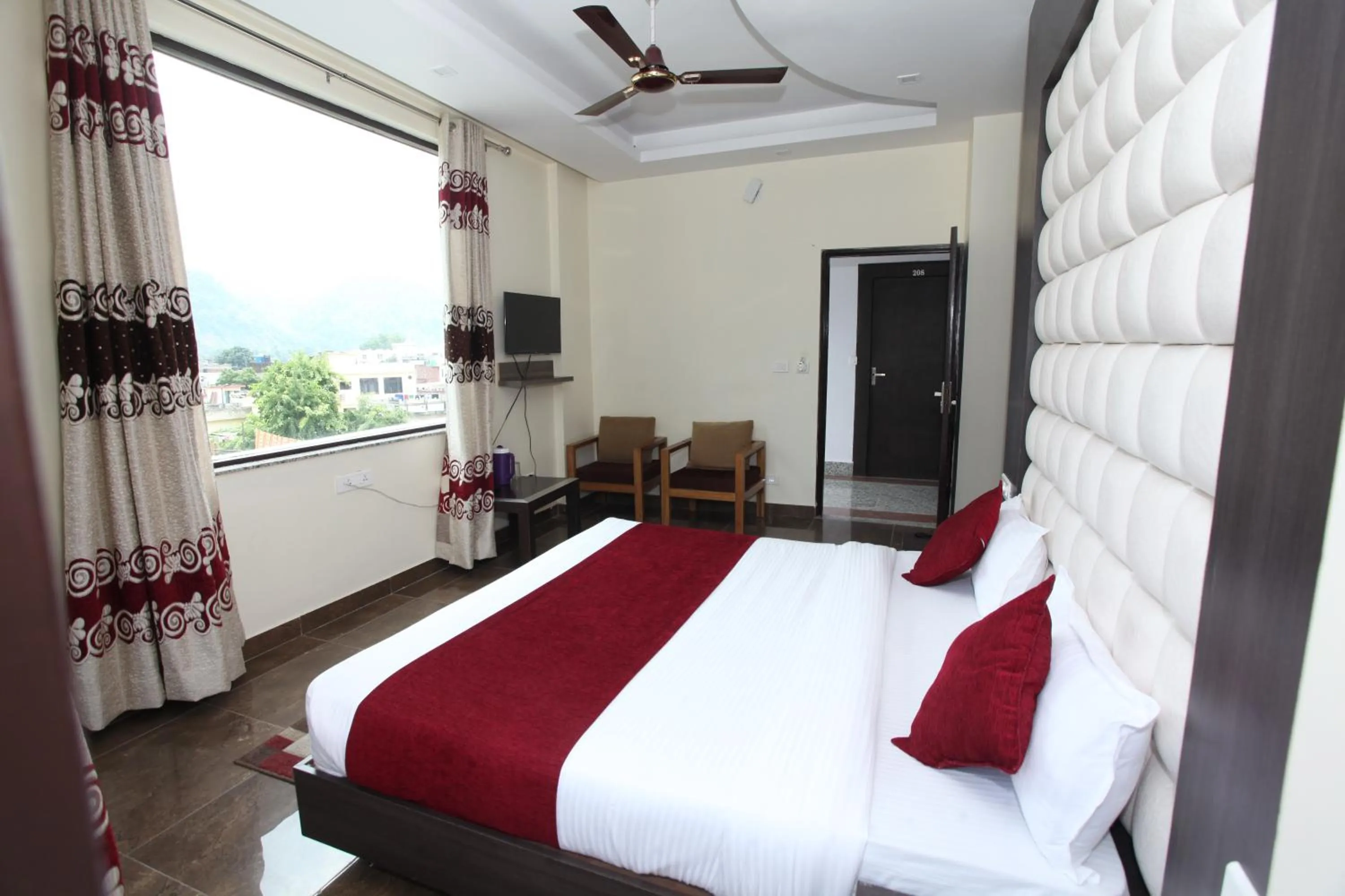 Photo of the whole room, Bed in Hotel Trihari