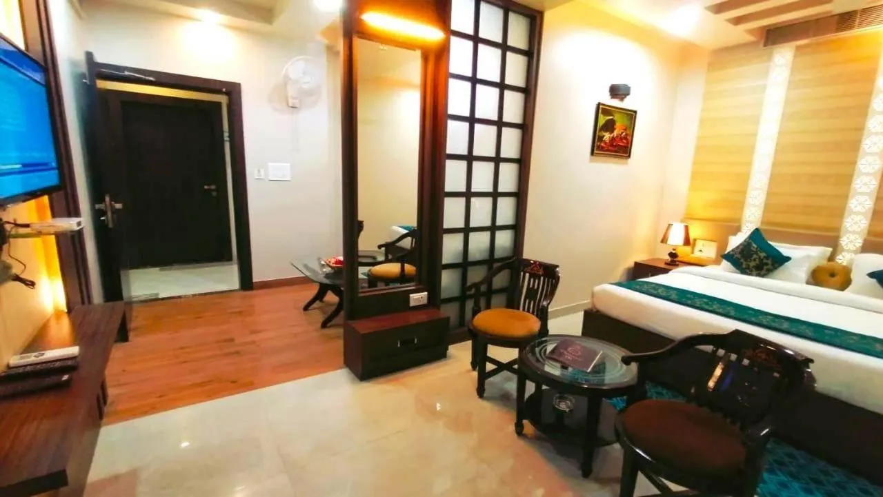 Living room, Bed in Hotel Ozas Grand