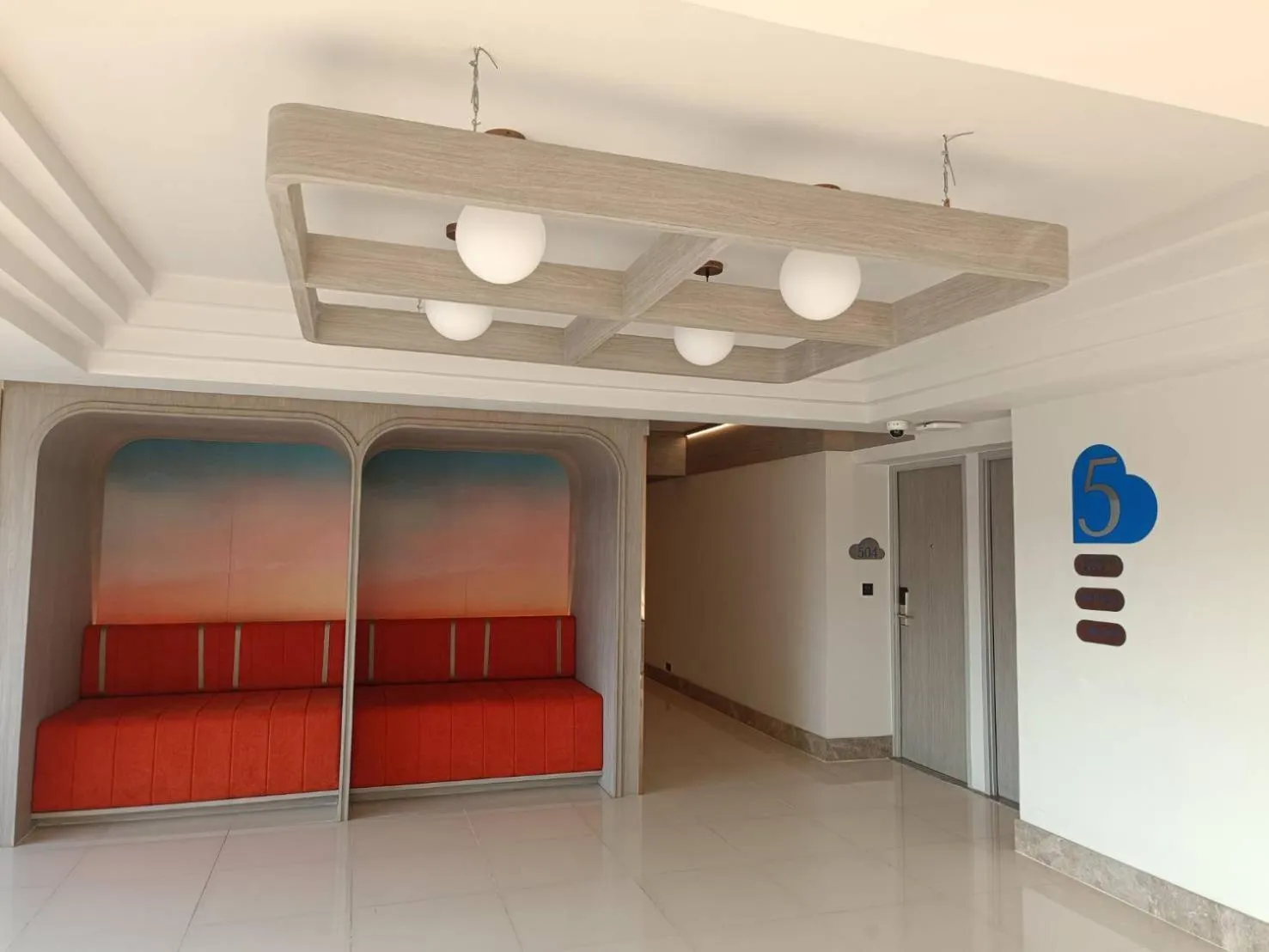 Seating area, Bed in Mike Hotel