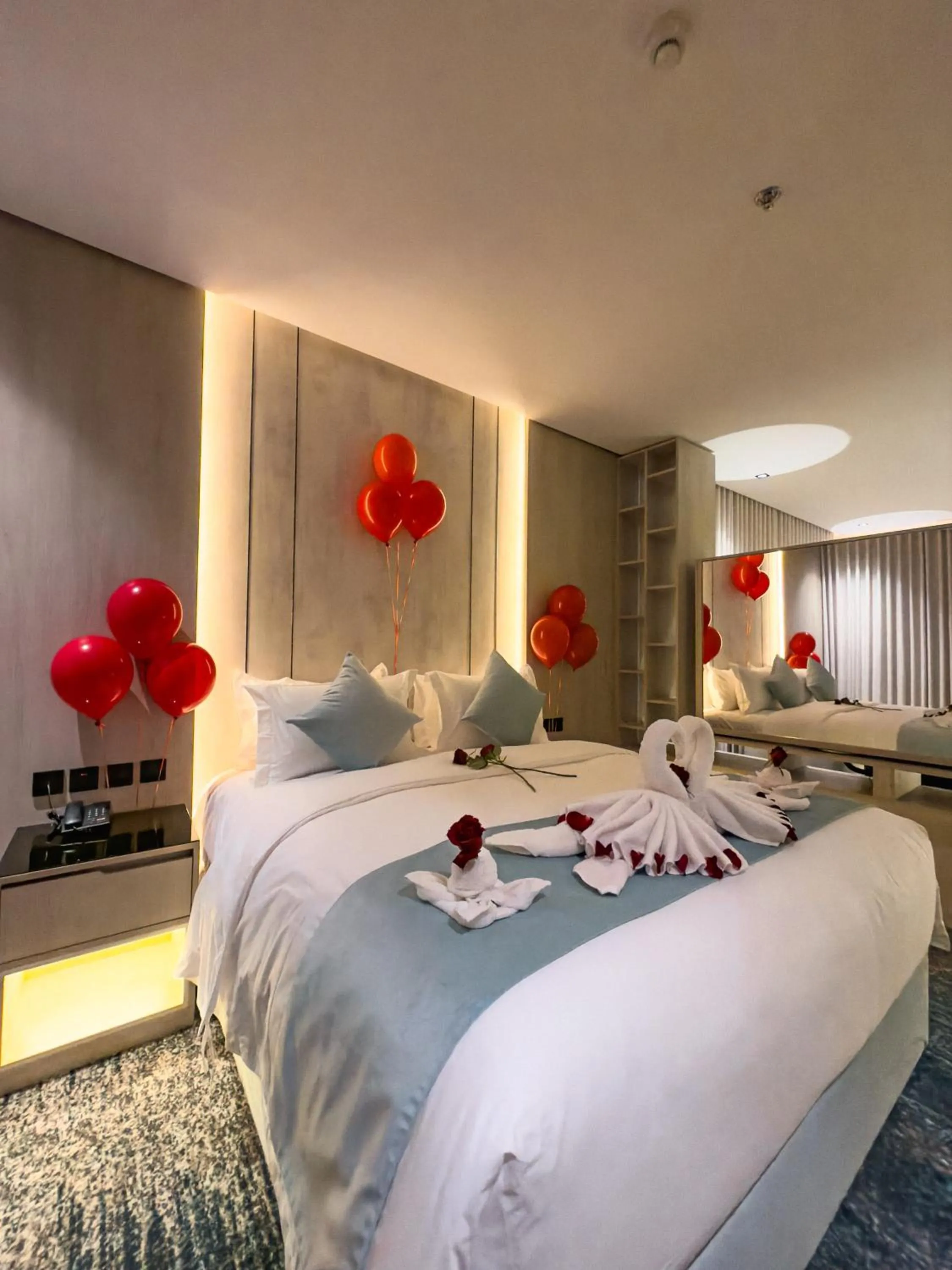 Bed in Rose Garden Hotel فندق روز جاردن