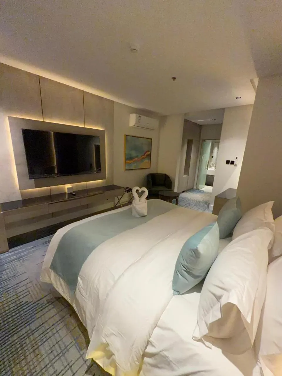 Bed in Rose Garden Hotel فندق روز جاردن