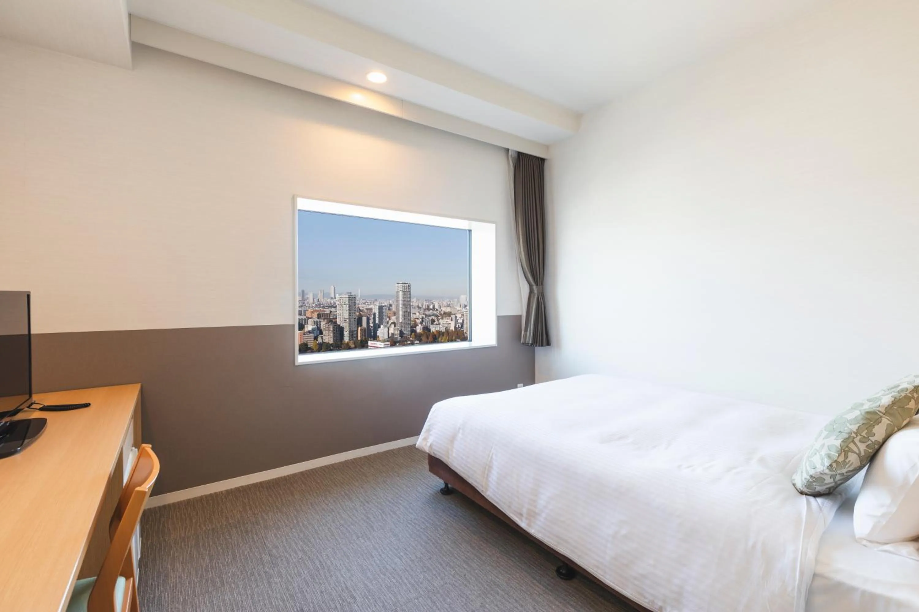 Photo of the whole room, Bed in Hotel Crown Hills Ueno Premier