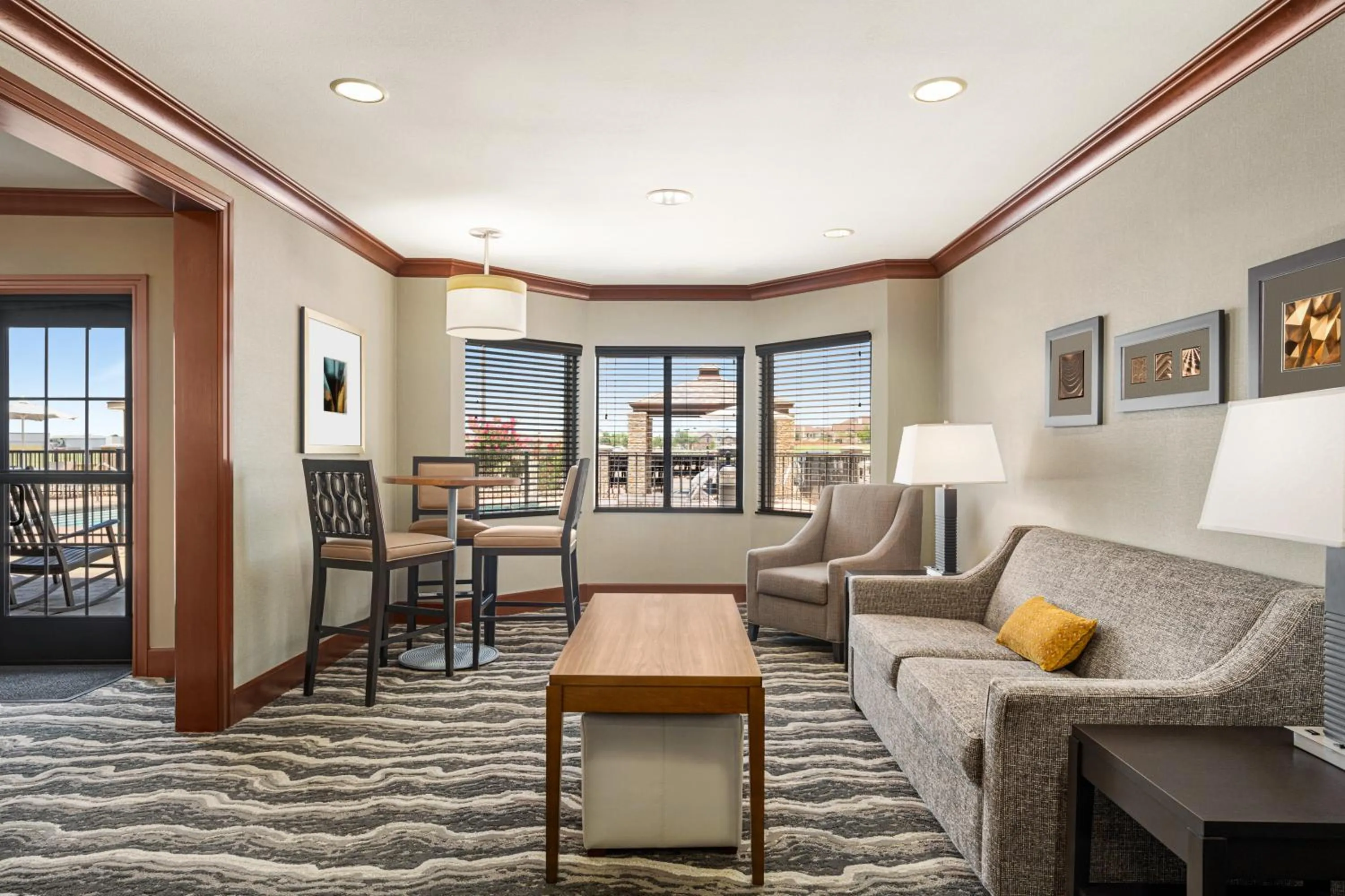 Seating area in Staybridge Suites Oklahoma City-Quail Springs by IHG