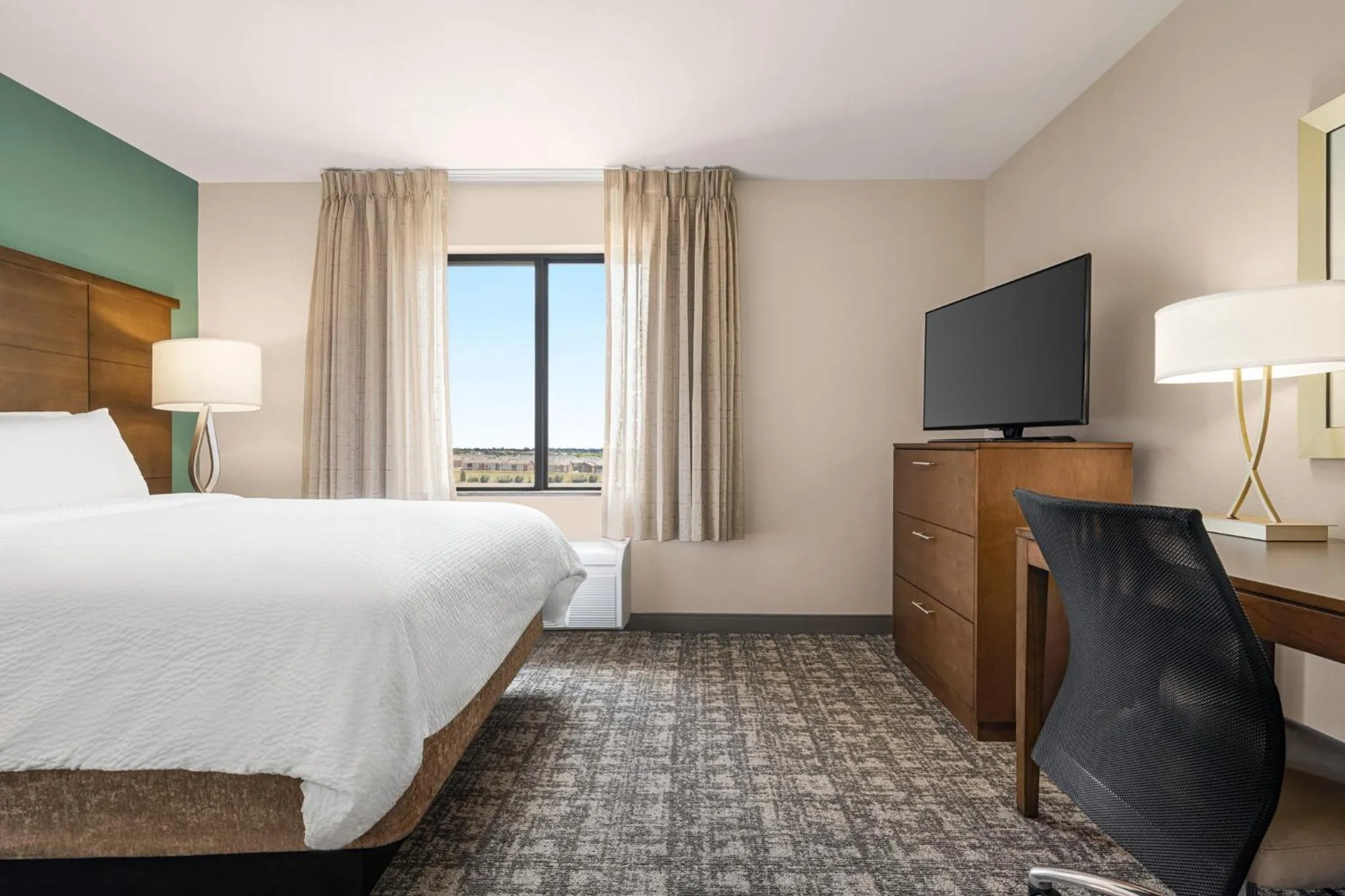 Photo of the whole room, Bed in Staybridge Suites Oklahoma City-Quail Springs by IHG