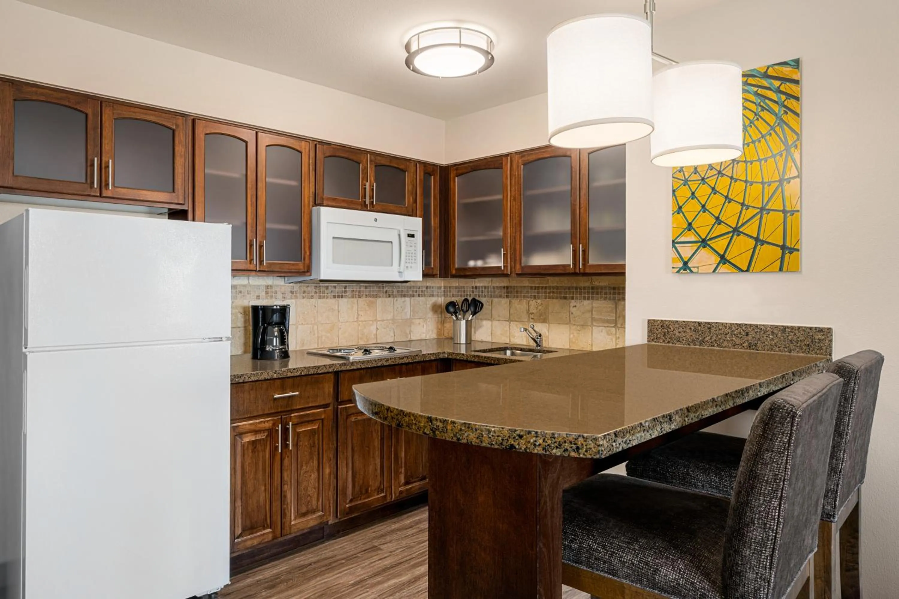 kitchen in Staybridge Suites Oklahoma City-Quail Springs by IHG