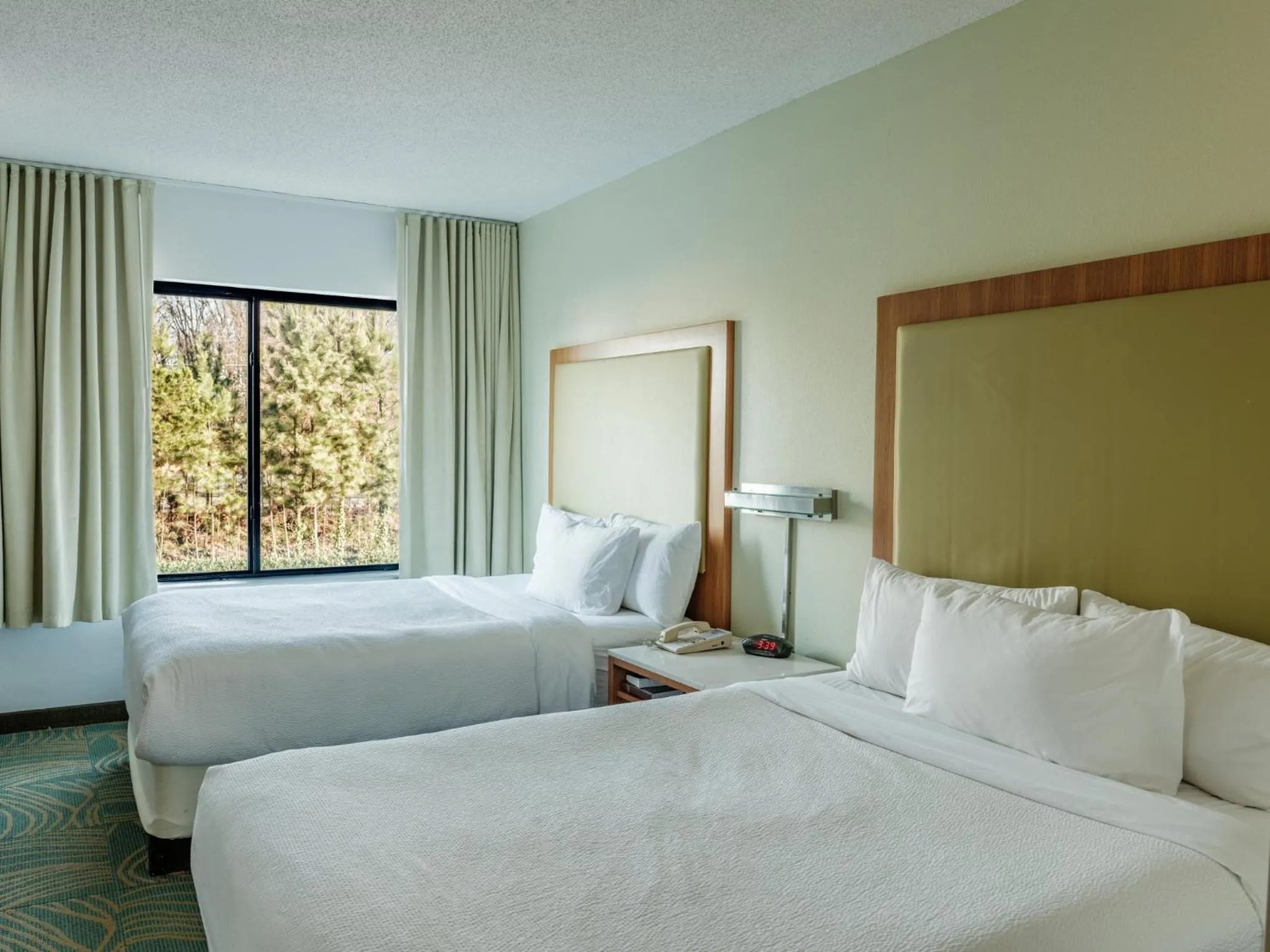 Photo of the whole room, Bed in The Beacon Charlotte Airport by IHG