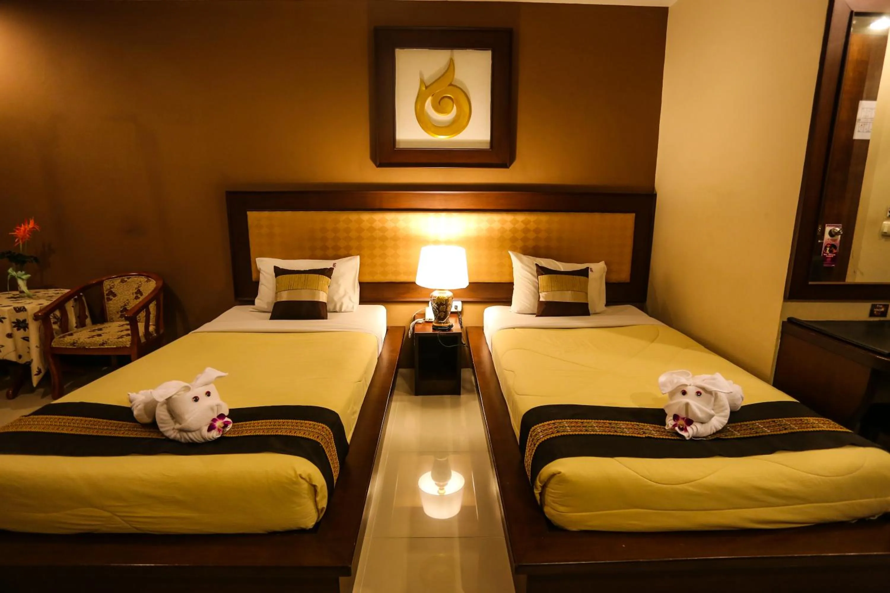 Bed in Madina Rayong Hotel