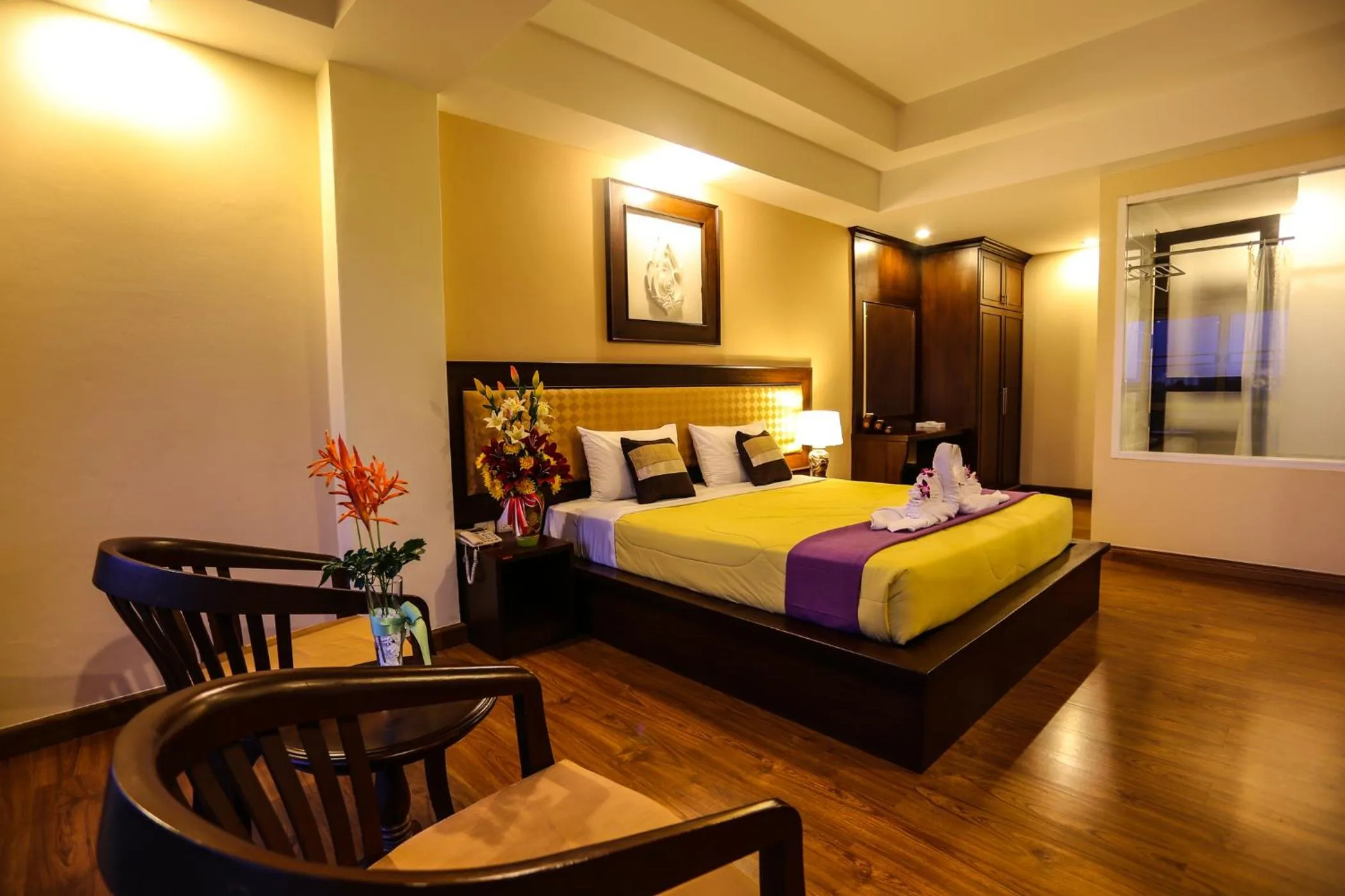 Bed in Madina Rayong Hotel