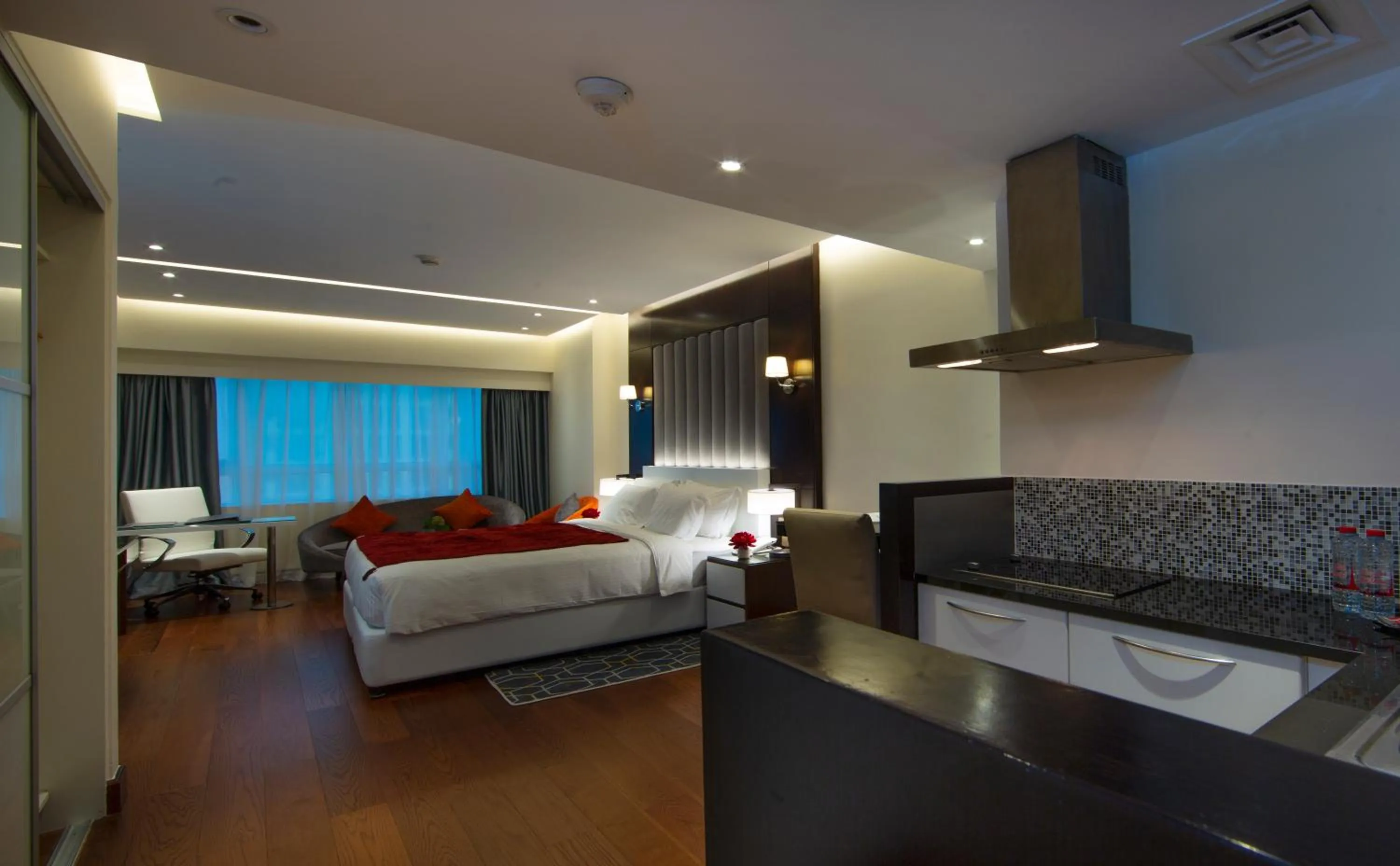 Photo of the whole room, Bed in Number One Tower Suites