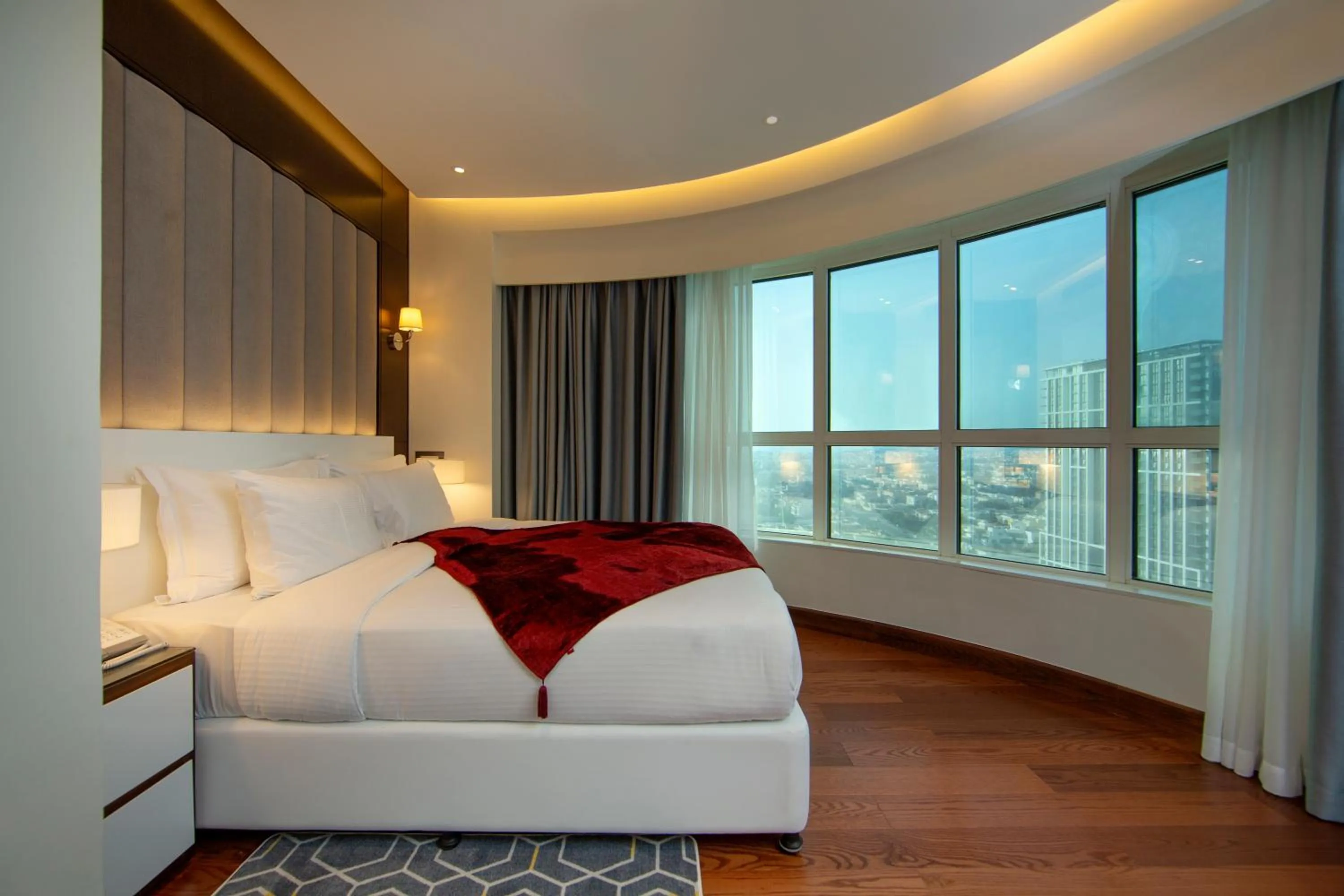 Bed in Number One Tower Suites